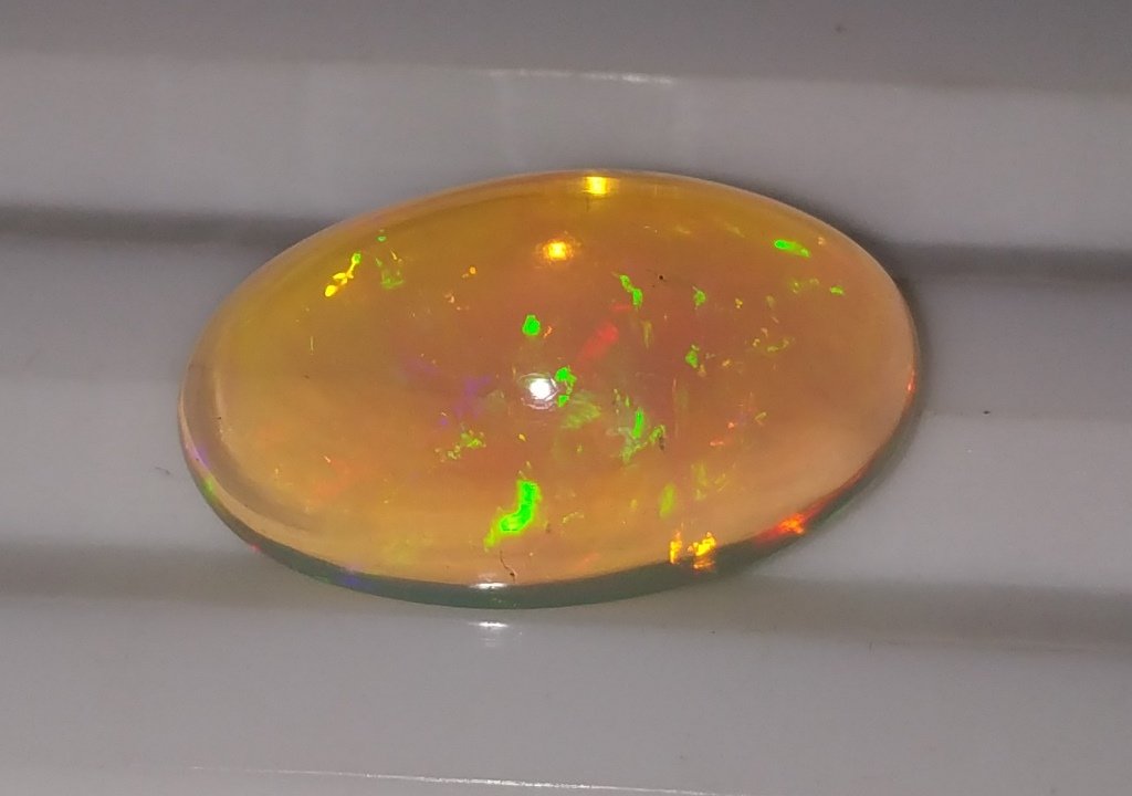 3.28 Ct Natural Oval Opal Gemstone (1 of 2)