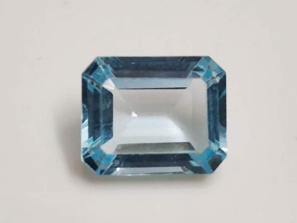6.89 Ct Emerald Cut Natural Blue Topaz: MM SIZE = 10.82 X 8.83 X 6.90