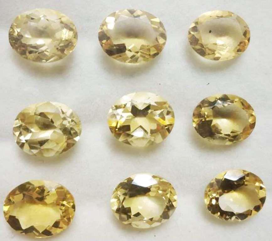 28.77 ct Natural Golden Yellow Oval Citrine Lot: Natural Golden Yellow Oval Citrine Lot~~MM Size 11 x 9 x 6~~