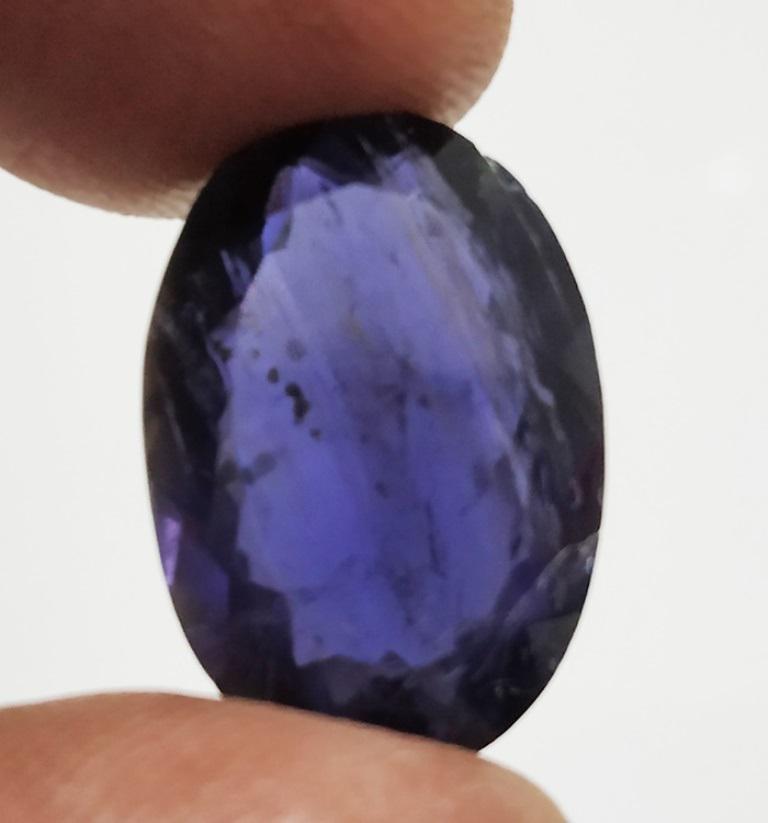 11.74 ct Oval Cut Natural Iolite Gemstone: MM SIZE =19.29 x 13.40 x 7.60