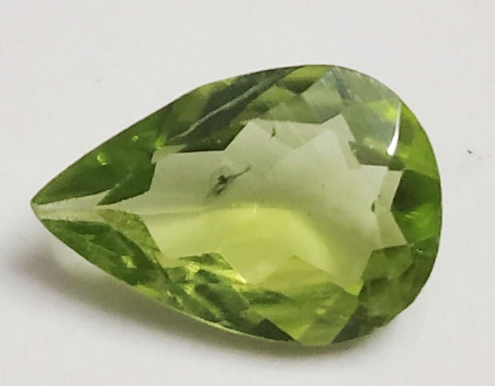 1.90 ct Pear Cut Natural Green Peridot: MM SIZE = 10.81 x 7.40 x 3.54