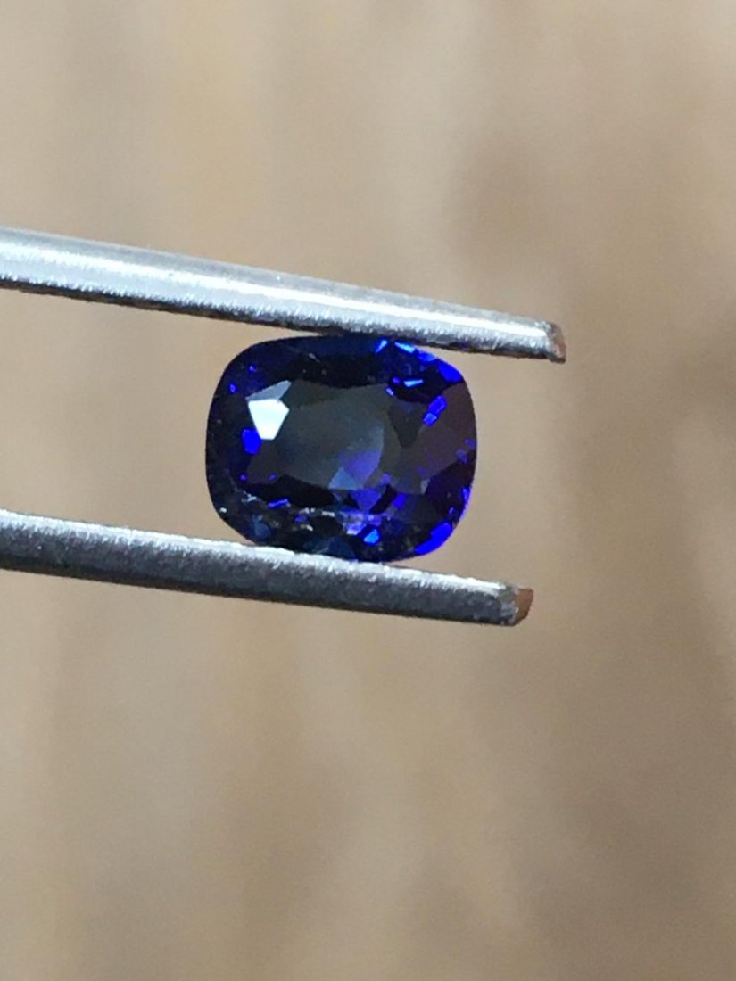 1.17 Carats | Natural Blue Sapphire: Stone Specifications Item Number:1476 Quantity:1 Weight:1.17ct Gem Type:Sapphire Shape:Cushion Size:6.04*5.35*4.03mm Color:Blue Clarity:SI Luster:Good Origin:Sri Lanka Treatment:HeatedCertficate:None 