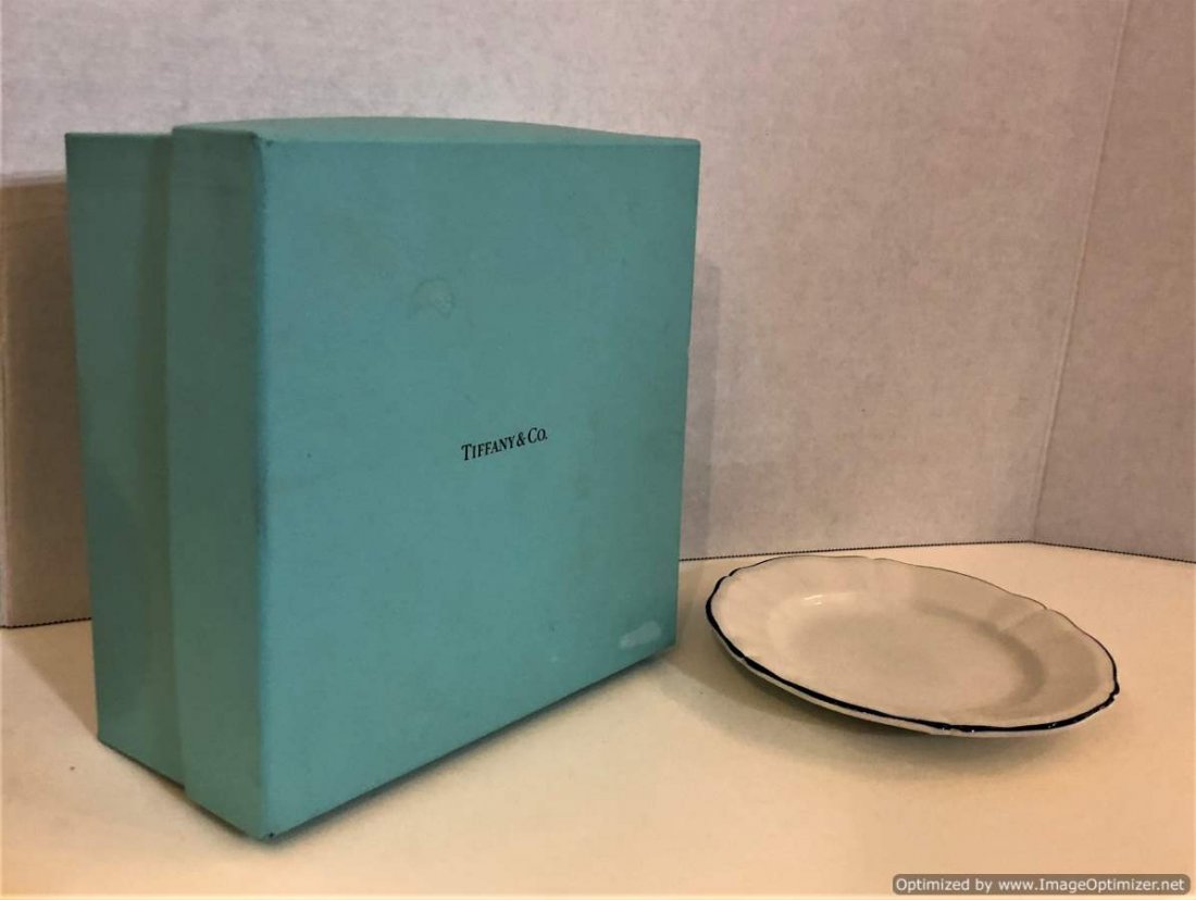Tiffany & Co. Tiffany Pagoda Bread & Butter Dish in Box: Tiffany & Co. Tiffany Pagoda Bread & Butter Dish in Box. Discontinued pattern: marked: Tiffany Pagoda, Made in France, Tiffany & Co., c. 2001. Comes with the Tiffany & Co. Box. Size: 6 3/8 in diameter