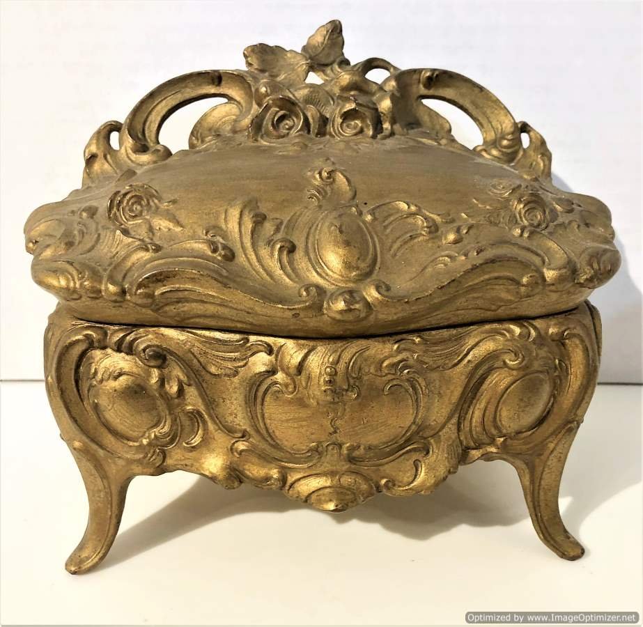 Jennings Brothers French Bombay Cast Metal Jewelry Box: Jennings Brothers French Bombay Cast Metal Jewelry Box; French Victorian, Bombay sides, Rococo design with roses, Footed Jewelry Box, original gold paint patina finish; marked on base J B [Jennings Br