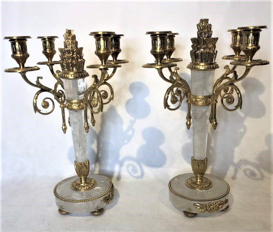 Two [2] Rock Crystal And Dore Bronze Candleabras: Two [2] Rock Crystal And Dore Bronze Candleabras. 4-arm. High quality. French Empire style. Size: 14.25 in. height, 10 in. wide, 5 in. diameter base.