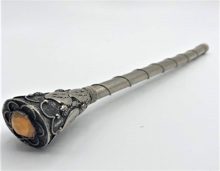Ornate Edwardian Silver Plate Umbrella or Baton Handle: Ornate Edwardian Silver Plate Umbrella or Baton Handle with amber faceted stone. Unmarked. Size: 10 3/4 in. length, 1 1/4 in. wide at top; 1/2 in. diameter bottom of handle.