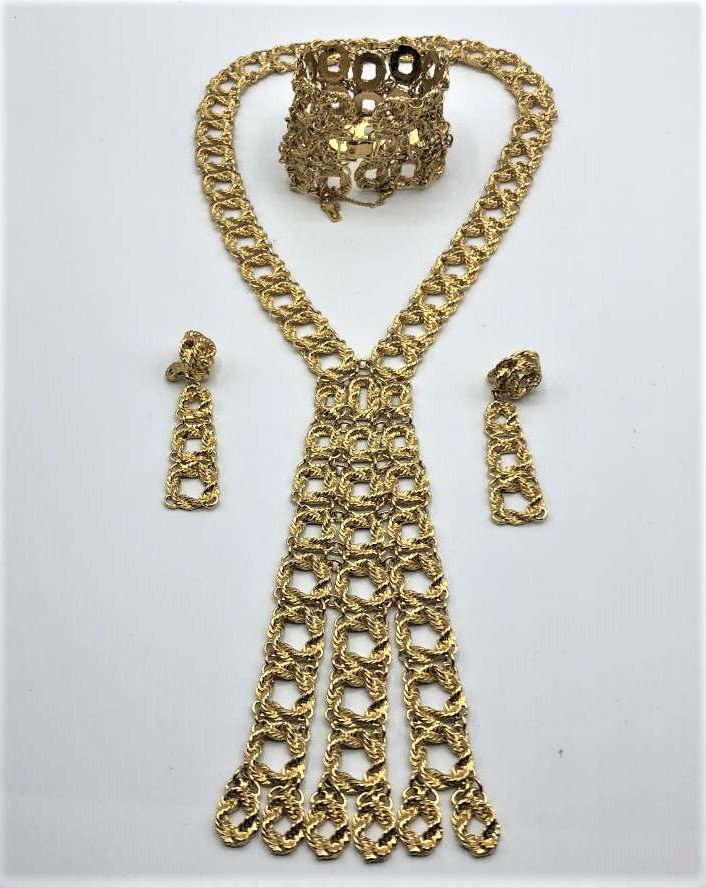 MONET Gold Tone Set: Necklace, Bracelet, Earrings: MONET Gold Tone Set: Necklace, Bracelet, Earrings. Line design. Sizes: necklace 16 in. overall length, bracelet 3 in. x 2 in. wide, earrings 2.5 in. length. original Monet tags.