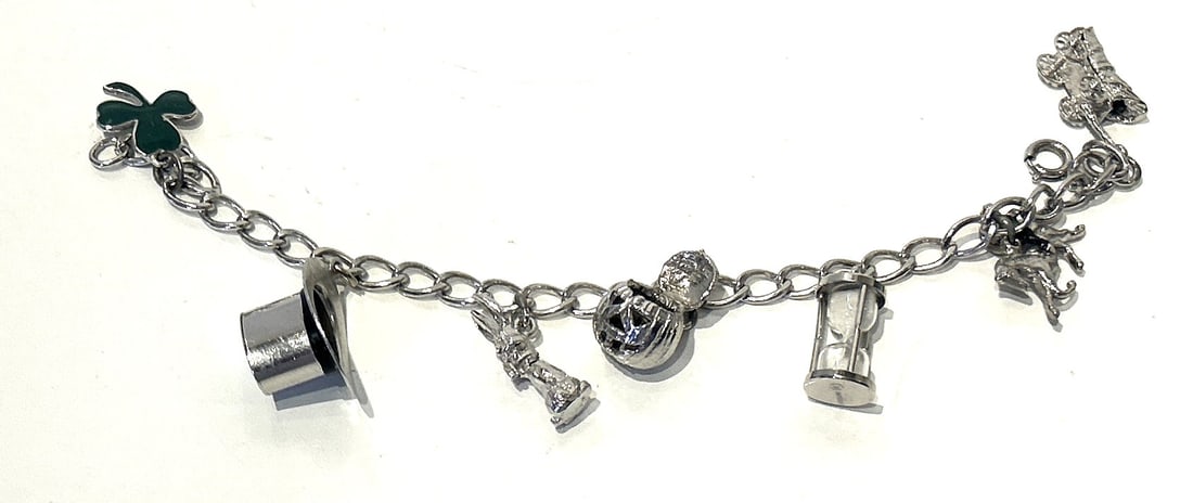 Sterling Silver Charm Bracelet with 7 Sterling Silver Charms, weighs 21.1 grams ; 6 3/4 in. (1 of 3)