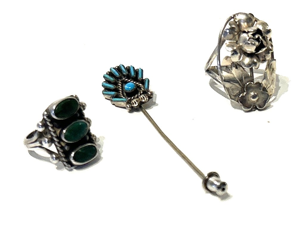 2 Native American Sterling Silver Rings and Sterling Silver Stick Pin with Turquoise: 2 Native American Sterling Silver Ring size 5.5, 3.4 in. x 3/4 in.; and Sterling Floral Ring Size 7, 3/4 in. x 1 1/8 in. with turquoise and Sterling Silver Stick Pin with Turquoise Easeowtard Zuni 3 i