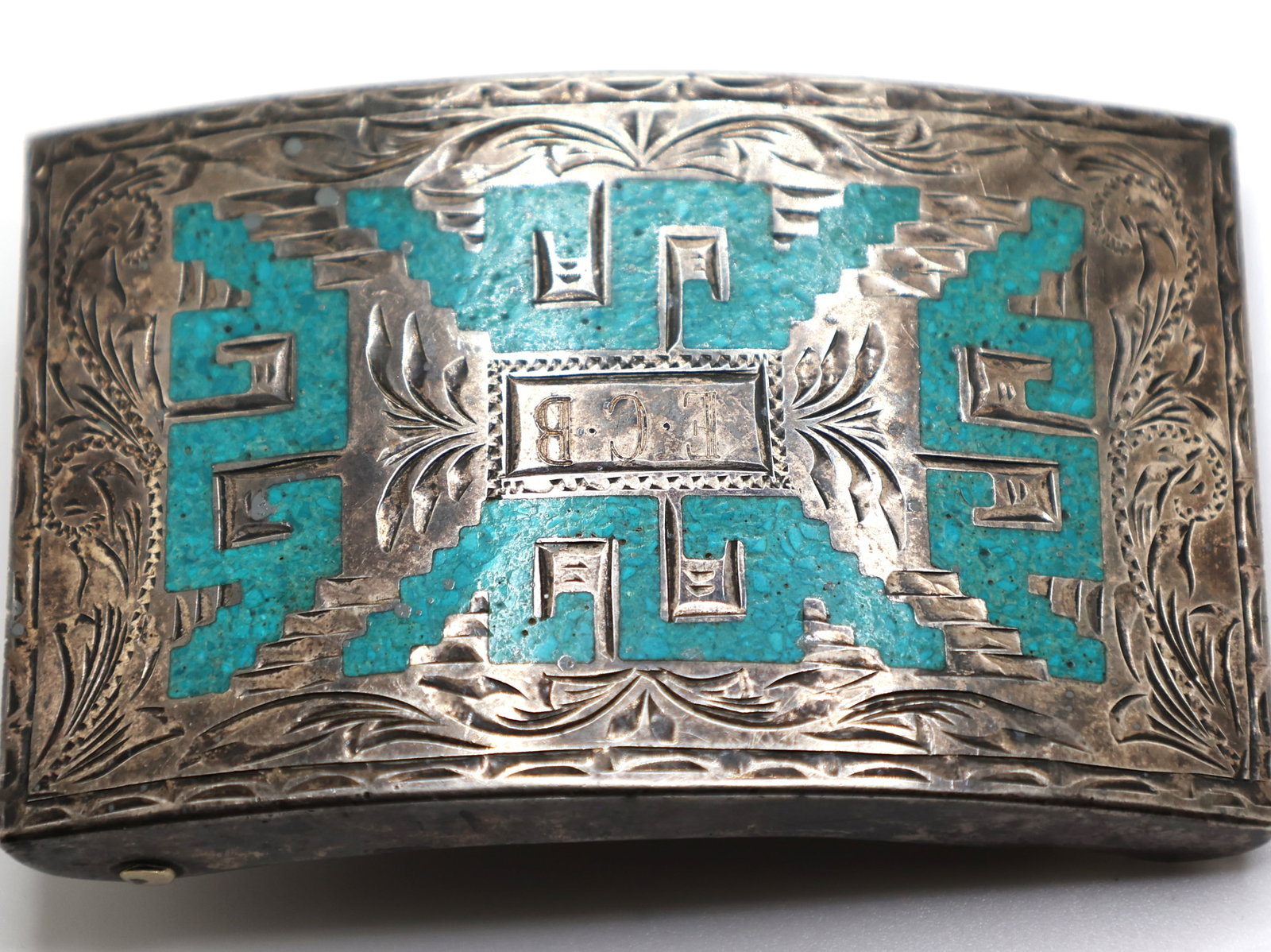 .925 Sterling Silver 60.8 grams Native American Indian Belt Buckle with Micro Mosaic Turquoise: .925 Sterling Silver 60.8 grams Native American Indian Belt Buckle with Micro Mosaic Turquoise. marked: Plat a D AALISCO 925 V.H.L.C. 6-9-73 Thanks Rand B ; 3 3/8 in. x 2 1/8 in.