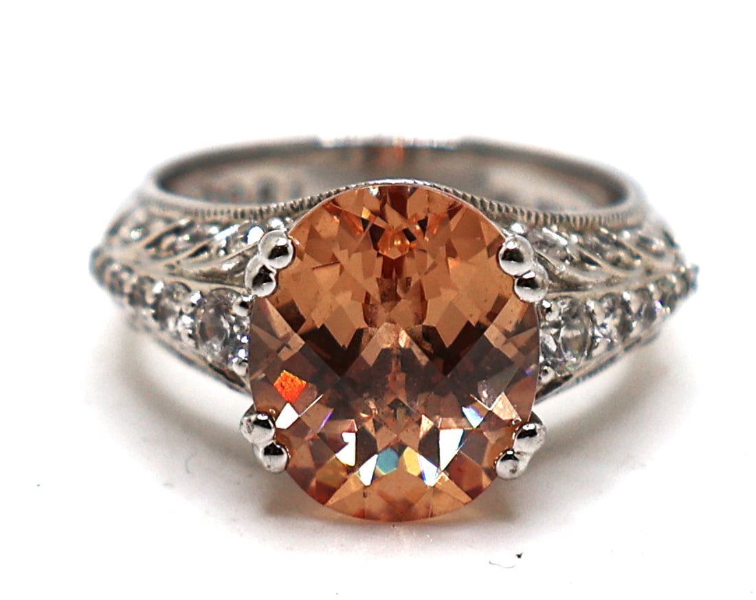 .925 Sterling Silver with Clear Side CZ and Center Stone Faceted Champagne CZ Ring Size 6.25: .925 Sterling Silver with Clear Side CZ and Center Stone Faceted Champagne CZ Ring Size 6.25 ; 7/8 in. x 1/2 in.