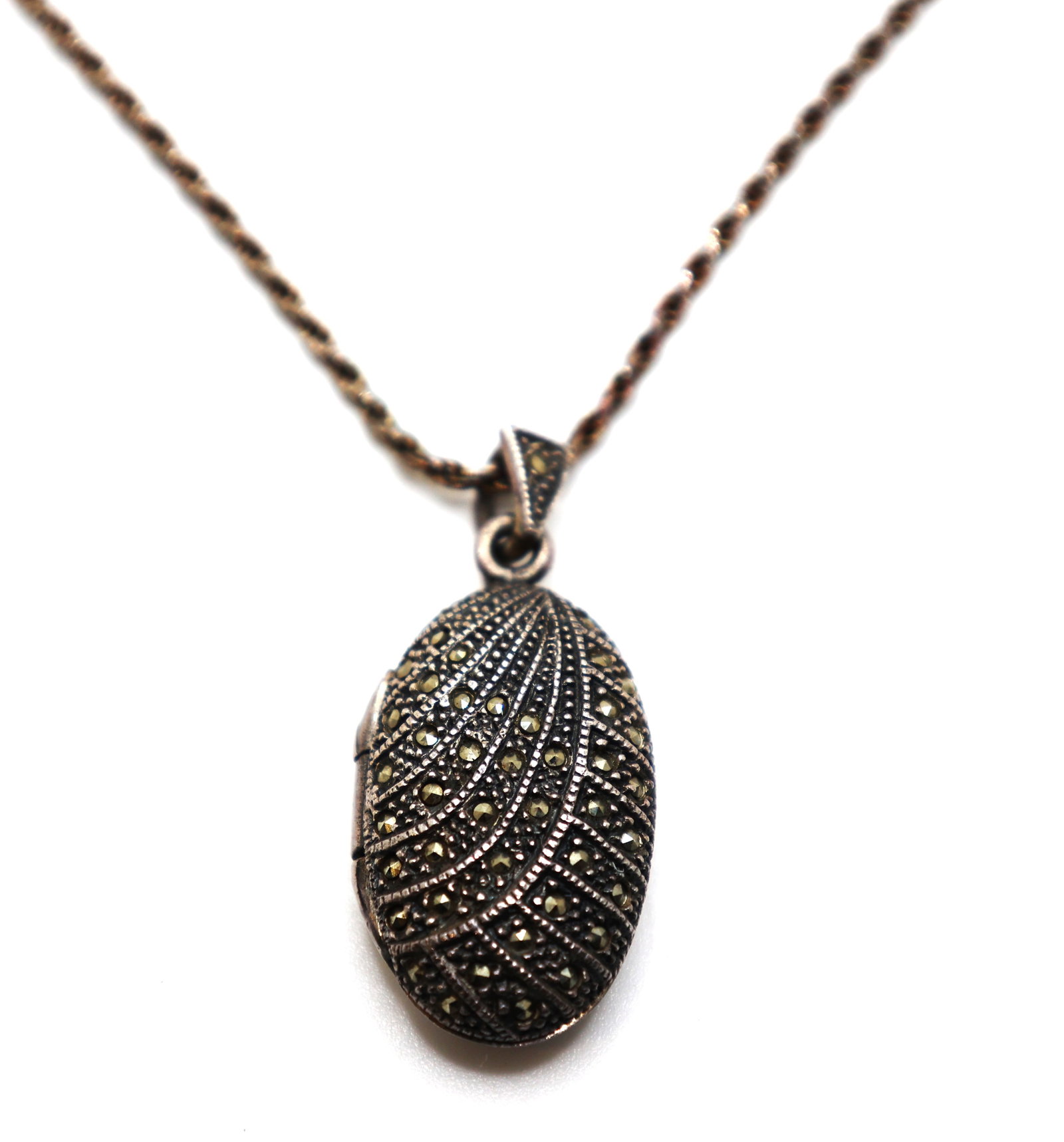 Art Deco Sterling Silver and Marcasites Locket Necklace on .925 Sterling 20 in. Rope Chain: Art Deco Sterling Silver and Marcasites Locket 1 5/8 in. x 3/4 in. Necklace on .925 Sterling 20 in. Rope Chain.