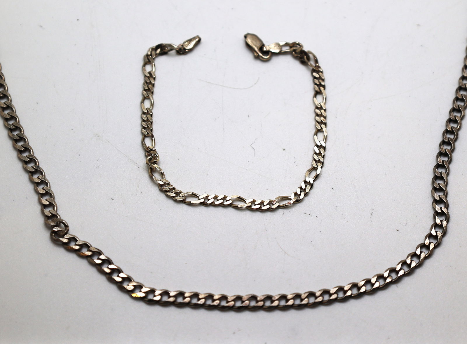 24.9 grams .925 Sterling Silver Italy Cuban Link Chain 24 in. x 1/4 in.; .925 Sterling Italy Figaro (1 of 2)
