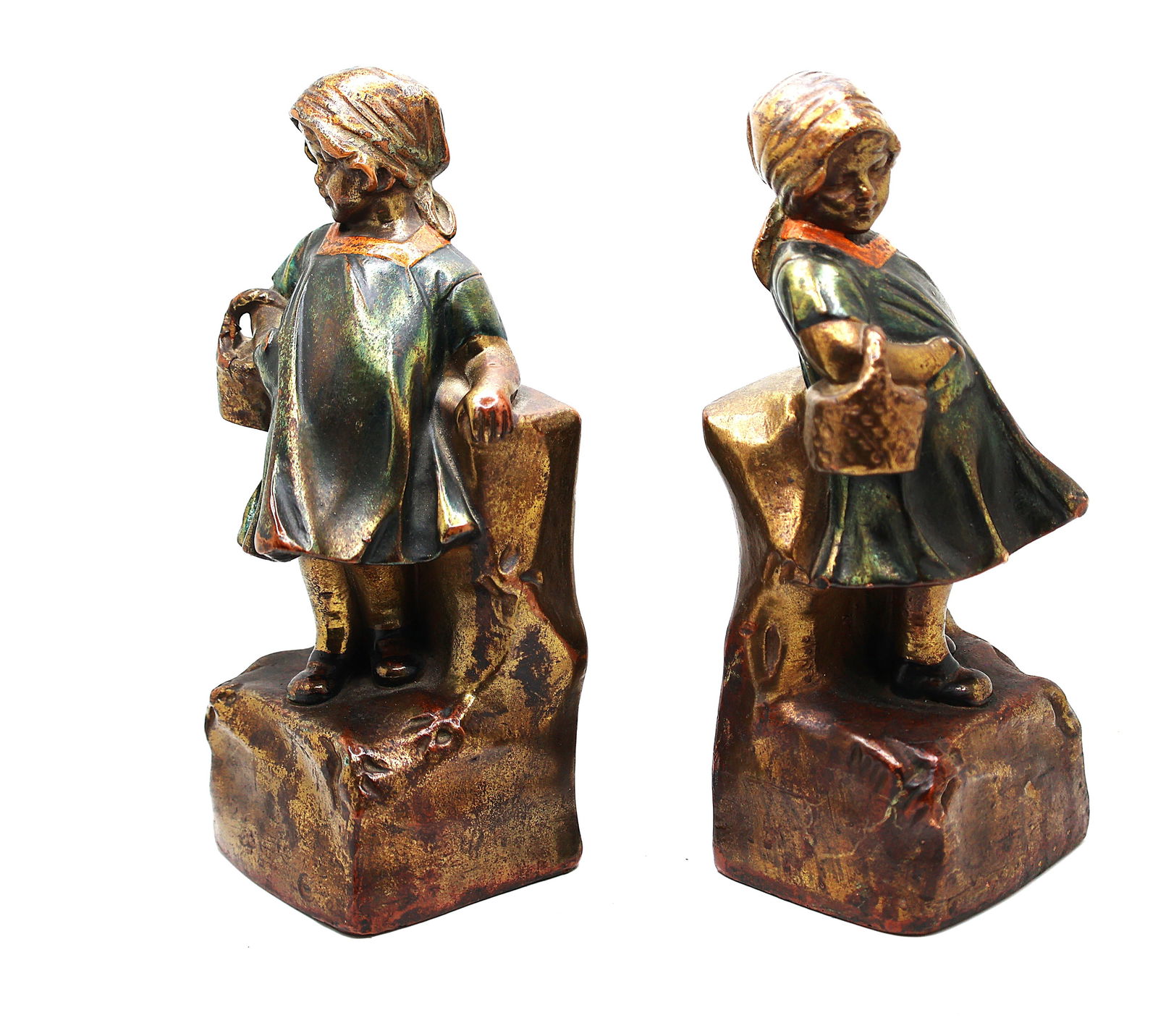 Bronze Clad Bookends Young Girl Holding Basket 7.75 in. height x 3 in. wide, good polychrome patina: Bronze Clad Bookends Young Girl Holding Basket 7.75 in. height x 3 in. wide, good polychrome patina.
