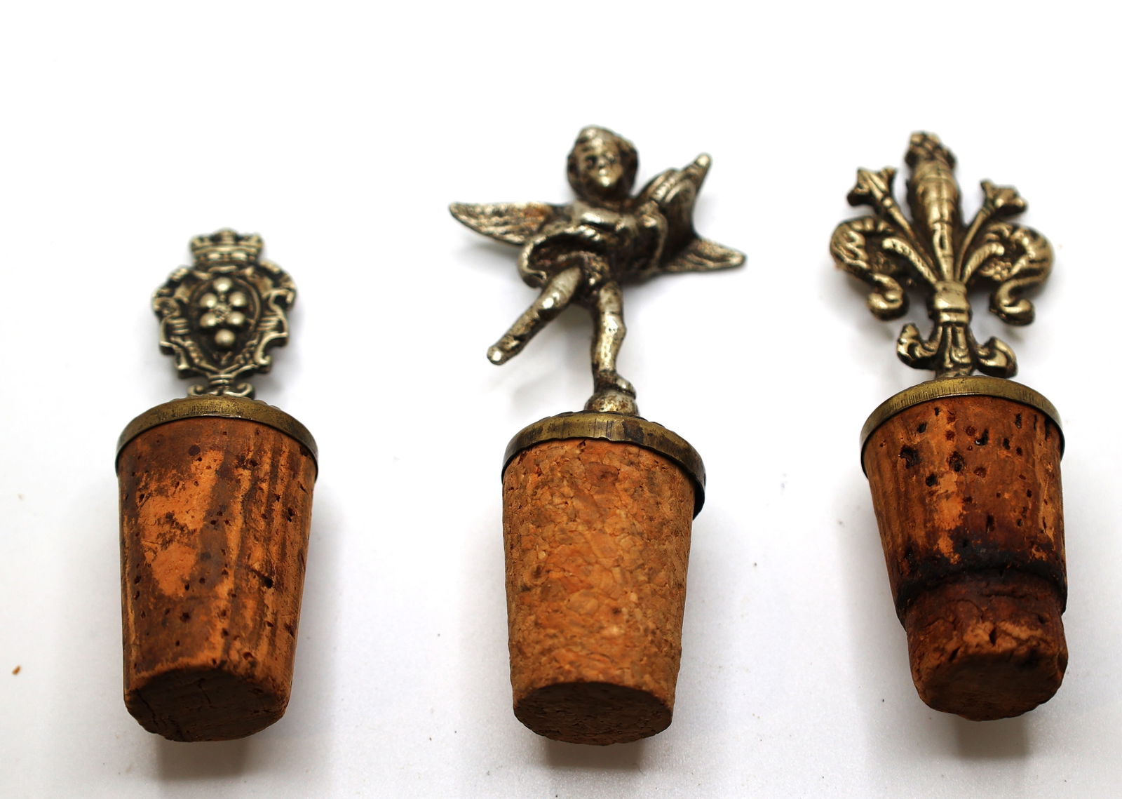 3 Assorted Pewter Bottle Cork Stoppers: Cupid 3.5 in., Fleur 3.75 in. , Crown 3.25 in. (1 of 3)