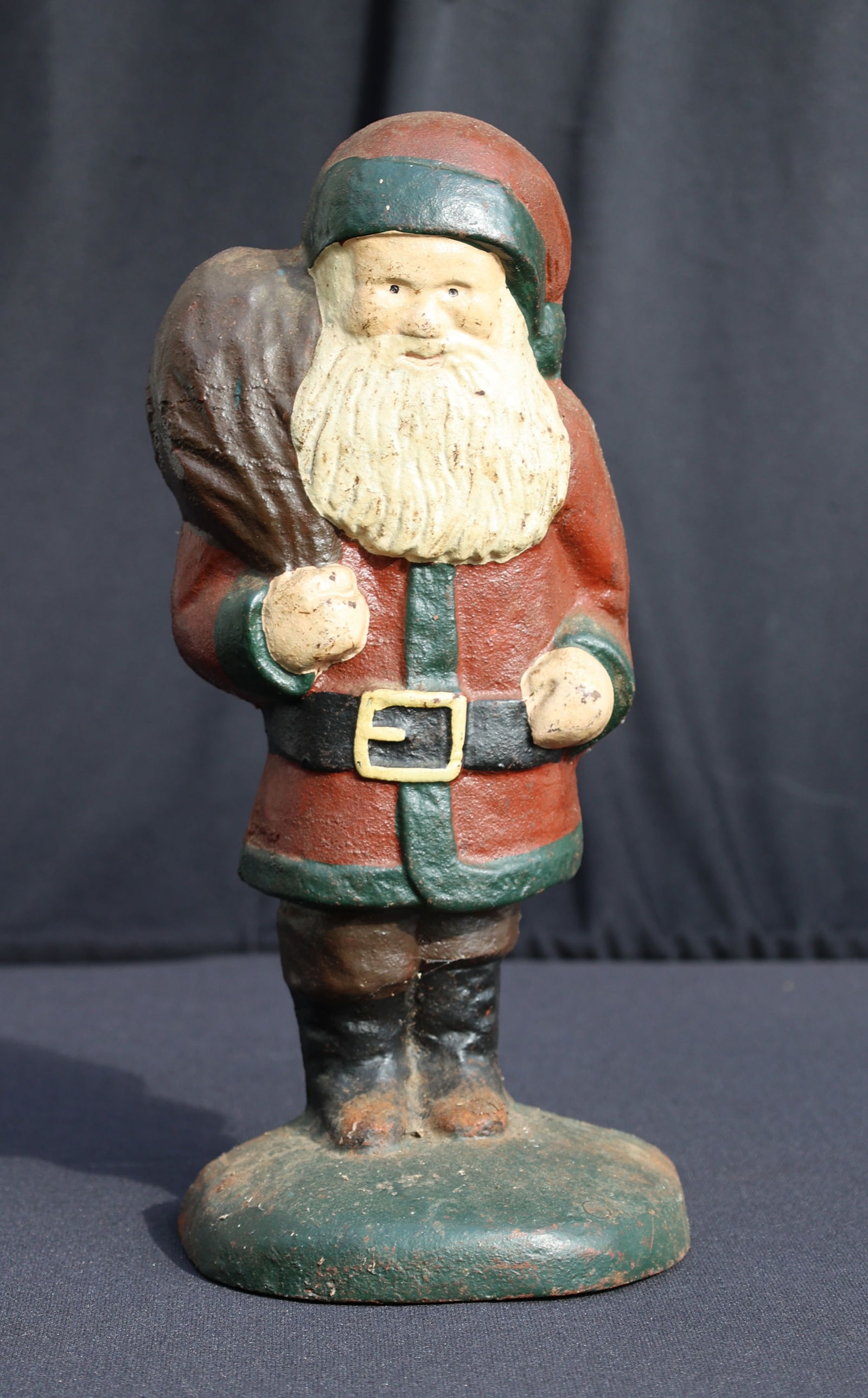 Cast Iron "Old Saint Nicholas" Santa Figural Doorstop 13 in. height x 5.25 in. wide, Original Paint (1 of 4)