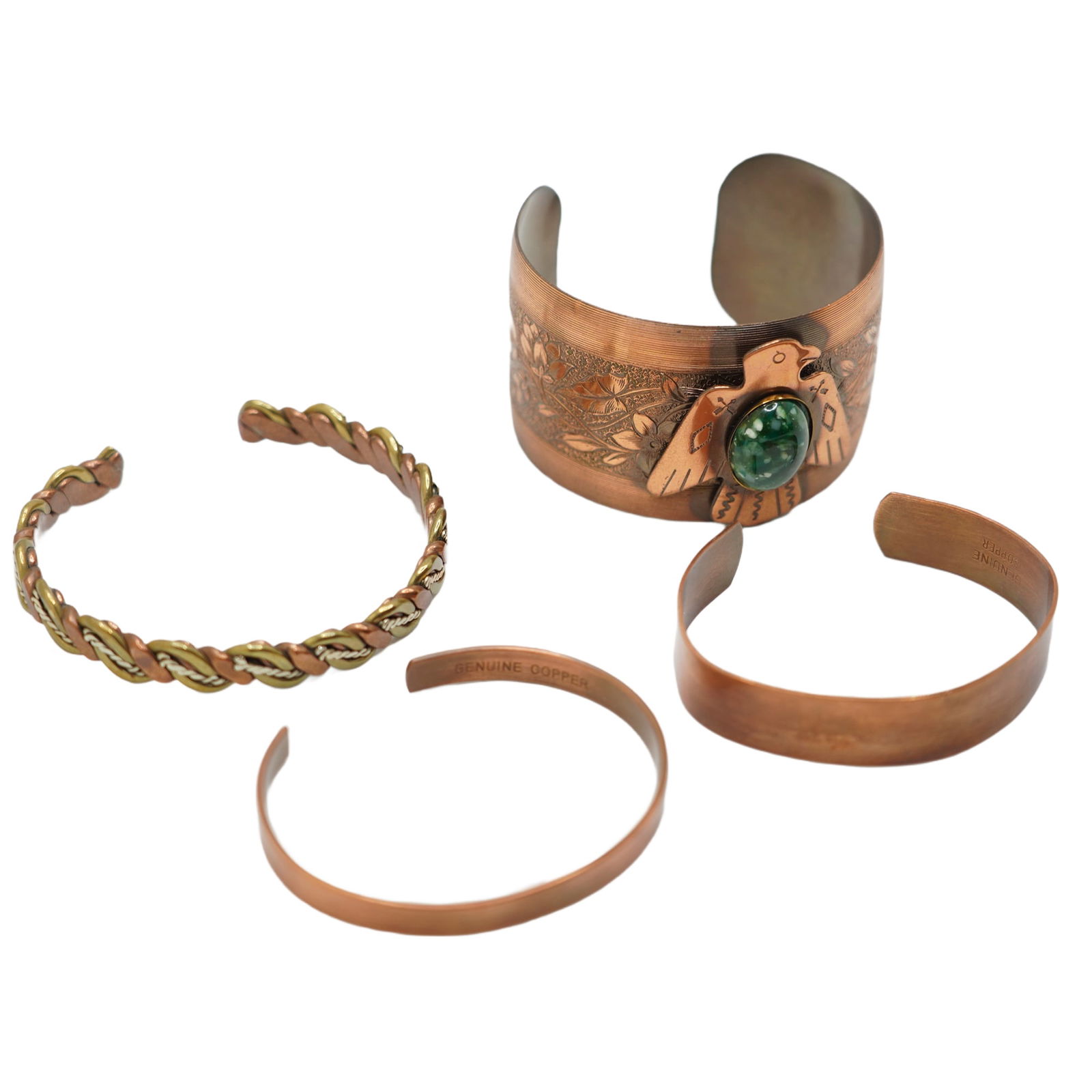 4 Assorted Vintage Copper Cuff Bracelets: average size 2 in.