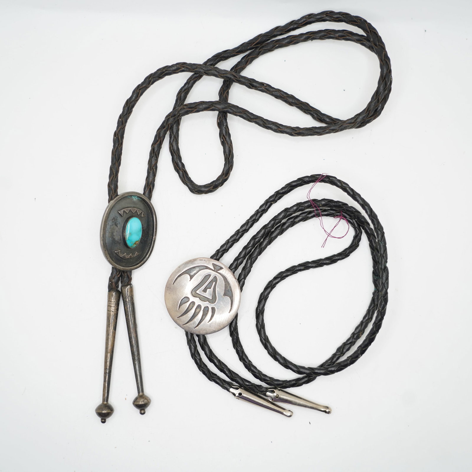 Navajo Sterling and Turquoise Bolo Tie & Sterling Bear Claw Slider Both on Leather Cord: 38 x 1 1/2 x 1 1/4 (Sterling w/ Turqoise), 34 x 1/2D (Bear Claw)