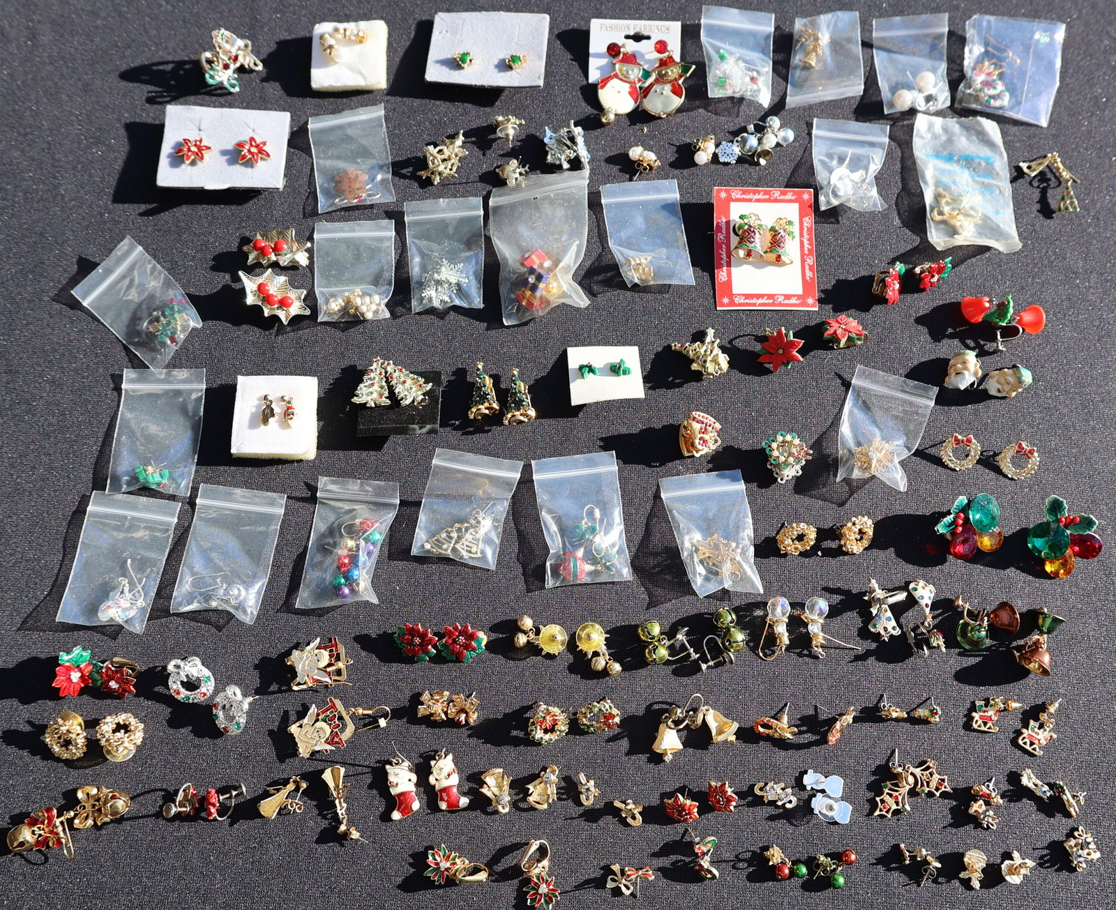 Collection of 83 Pairs Assorted CHRISTMAS HOLIDAY FASHION EARRINGS - SEE PICTURES: Collection of 83 Pairs Assorted CHRISTMAS HOLIDAY FASHION EARRINGS - SEE PICTURES. Average Size: 1 in.