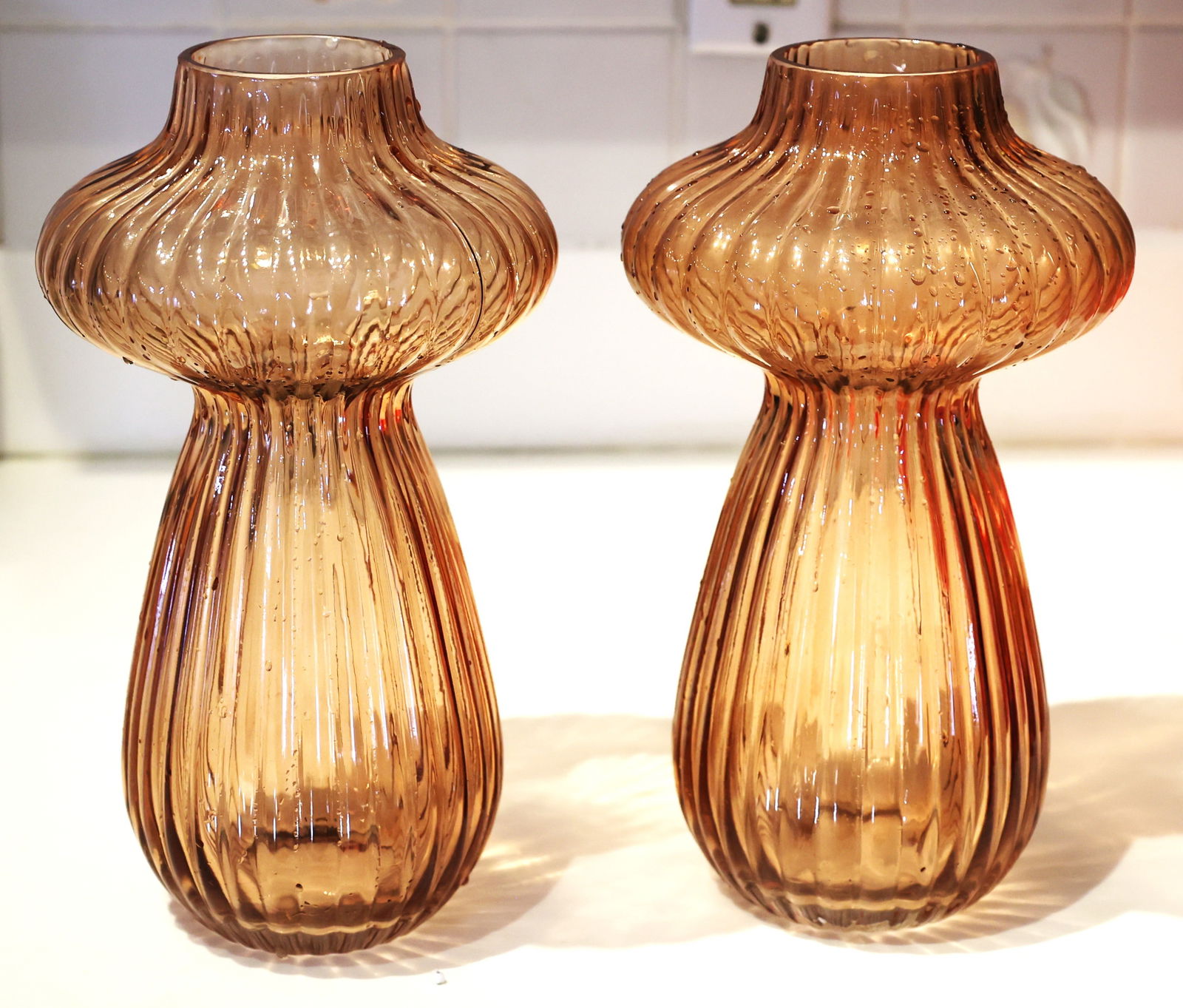 Pair Amber Glass Ribbed Gourd Shaped Vases 11.5 inches height x 6 inches wide: Pair Amber Glass Ribbed Gourd Shaped Vases 11.5 inches height x 6 inches wide; top 2 3/4 in. diameter; base 3 in. diameter
