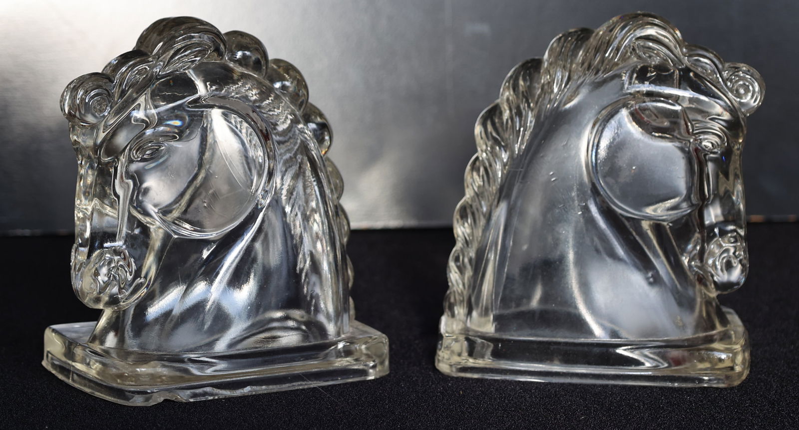 Equestrian Clear Glass Horse Head Bookends 5 1/2 in. height x 4 3/5 in. wide x 3 1/4 in. depth: Equestrian Clear Glass Horse Head Bookends 5 1/2 in. height x 4 3/5 in. wide x 3 1/4 in. depth. Made by Federal Glass. Vintage.