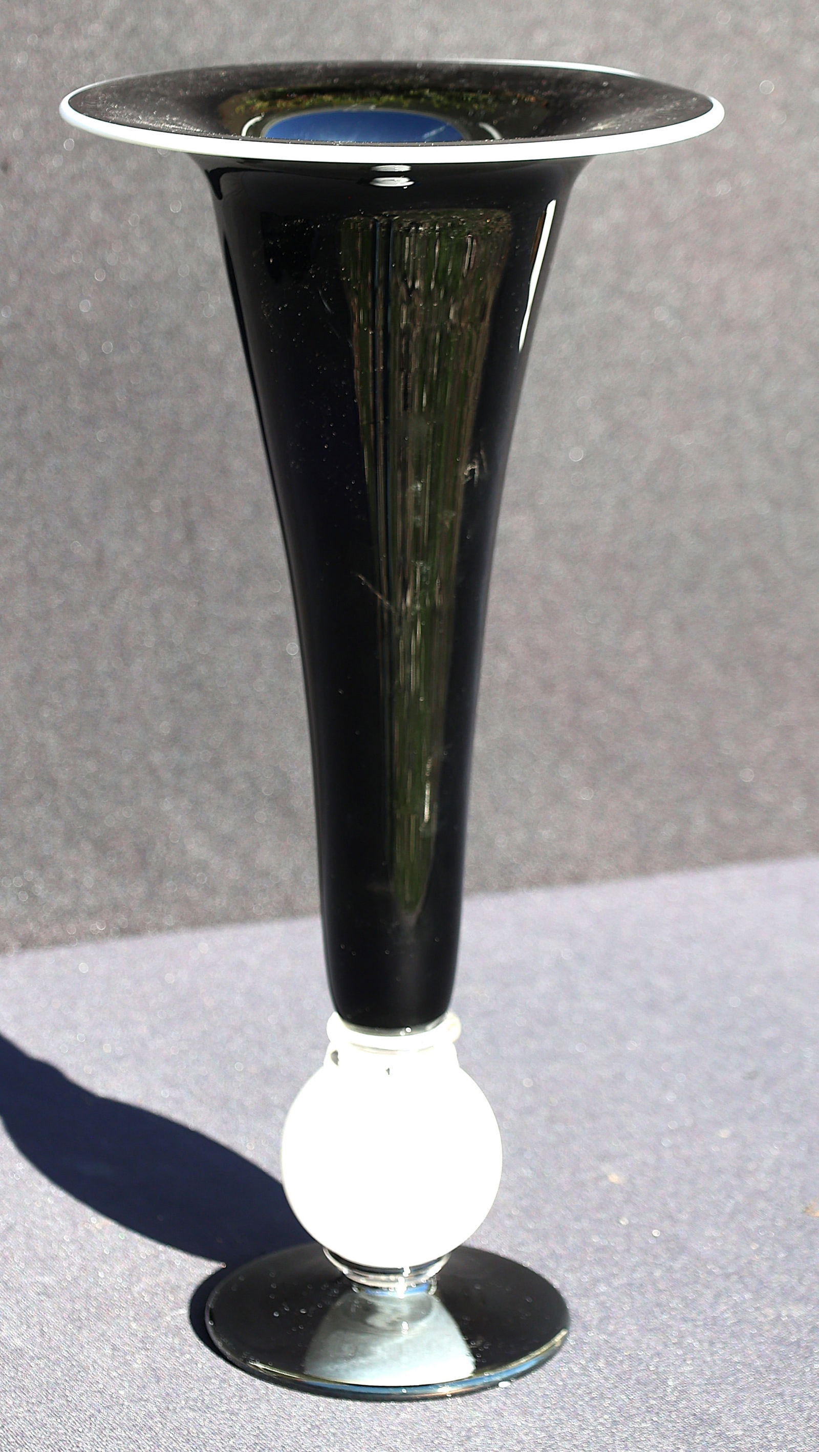 Signed Sterns, Studio Art Glass Tall Black and White Trumpet Vase 16 Inches Height: Signed Sterns, Studio Art Glass Tall Black and White Trumpet Vase 16 Inches Height; Size: 16 in. height x 8 in. dia. top x 4 3/4 in. dia. base
