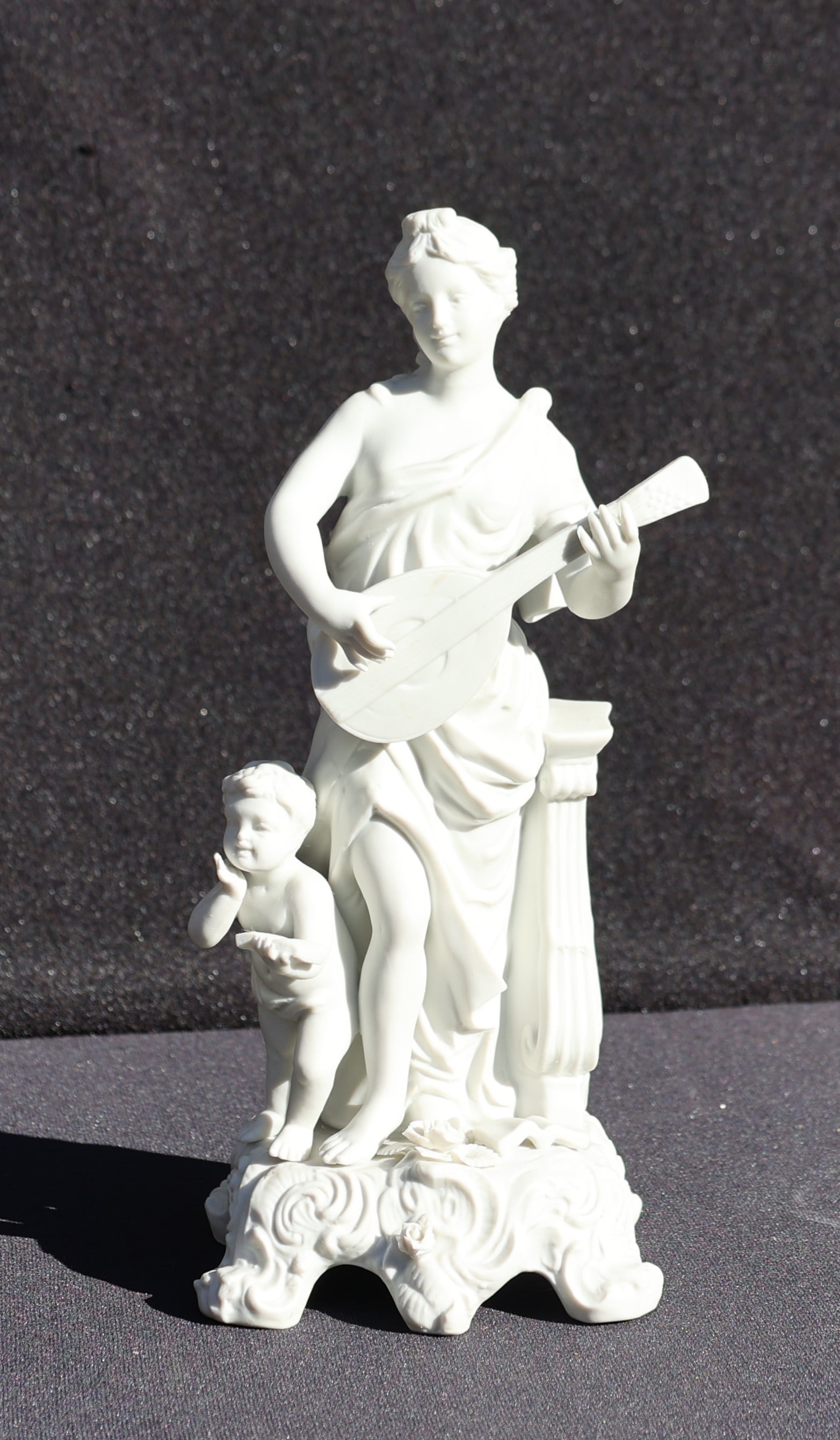 19th C. Porcelain Woman Minstrel And Child Holding A Book Figure Statue 11.5 in. Height x 5 in.: 19th C. Porcelain Woman Minstrel And Child Holding A Book Figure Statue 11.5 in. Height x 5 in. x 5 in.
