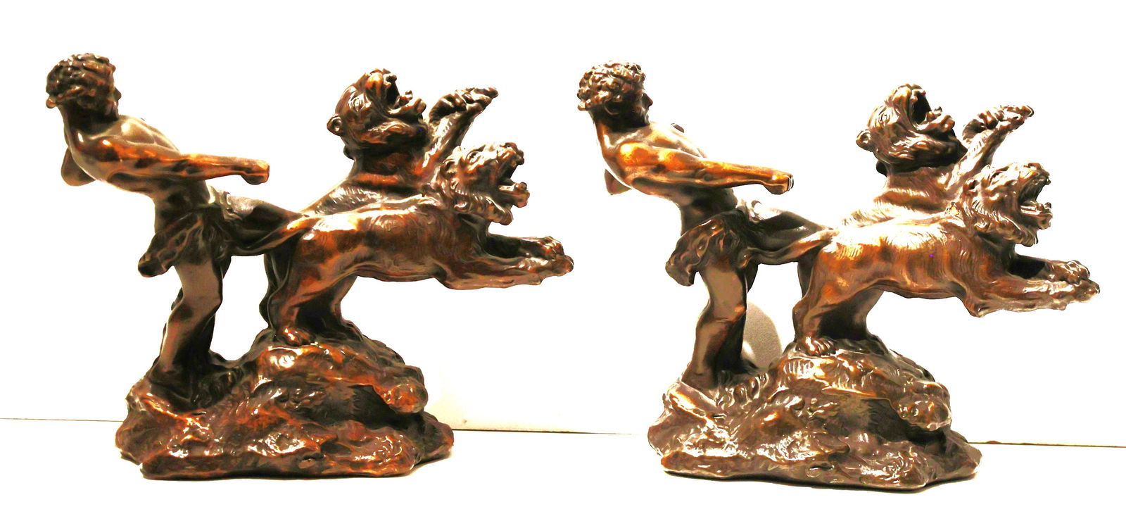 c. 1928 Armor Bronze Corp Hercilues Bookens in Bronze Clad: c. 1928 Armor Bronze Corp Hercilues Bookens in Bronze Clad. Size: 7 1/2 in. height x 10 in. length, good patina.