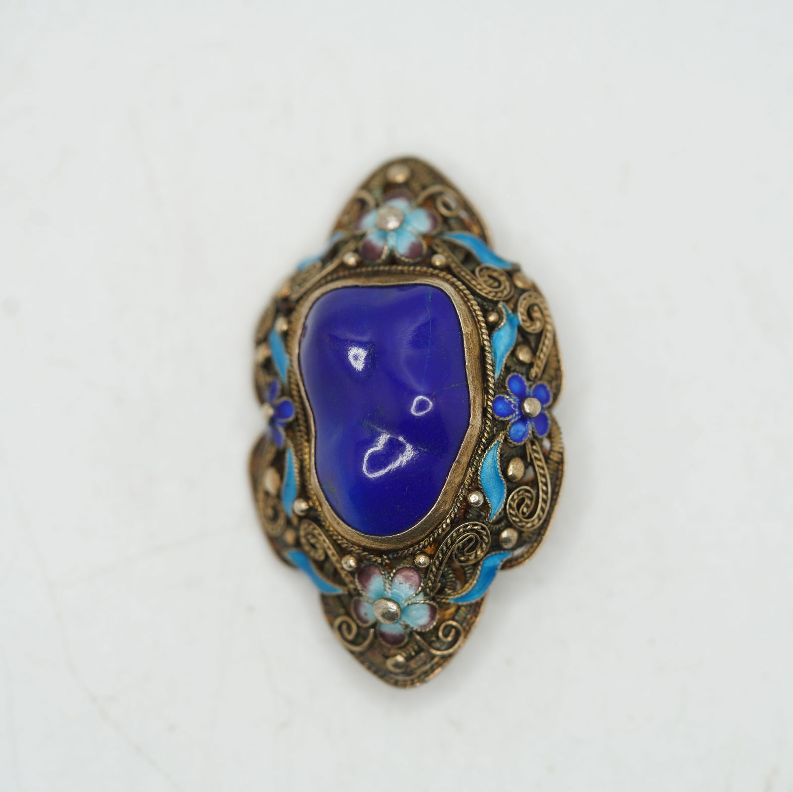 Marked Silver, Vintage Blue Glass Center Stone with Enameled Flowers Filigree Pin: Marked Silver, Vintage Blue Glass Center Stone with Enameled Flowers Filigree Pin. Size: 1 3/4 in. x 1 in.