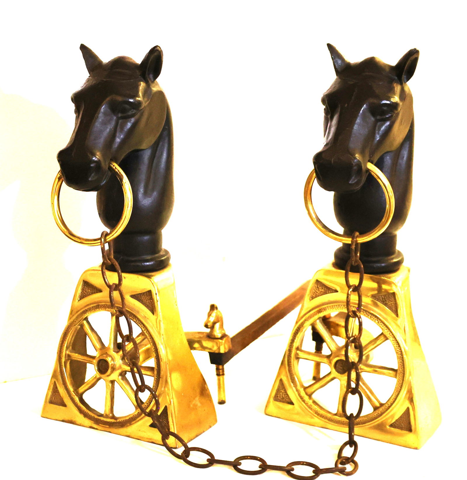 Fabulous Cast Iron and Brass Horse Head Hitching Post Equestrian Fireplace Andirons: Fabulous Cast Iron and Brass Horse Head Hitching Post Equestrian Fireplace Andirons. Nice Quality. With Original Chain Linking The Two Sides. Size: 17 1/4 inches height ; 7 1/4 in.wide x 3 1/2 in. deo