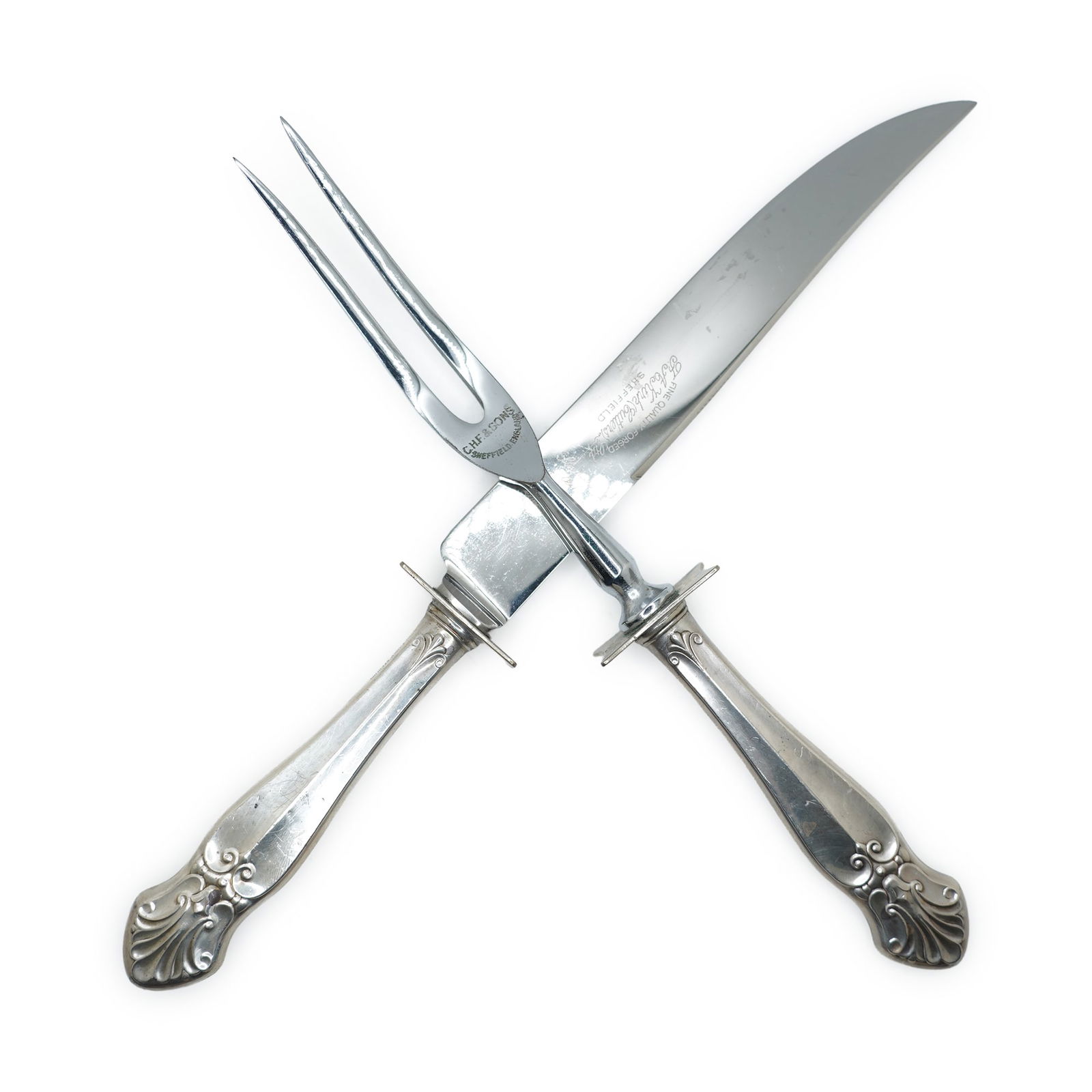 2 Pc. F A Kirk Cutlery Sheffield England Sterling Silver Handles Carving Set: 2 Pc. F A Kirk Cutlery Sheffield England Sterling Silver Handles Carving Set. Size: knife 11 in. x 1 in.; fork 9 1/4 in. x 7/8 in.