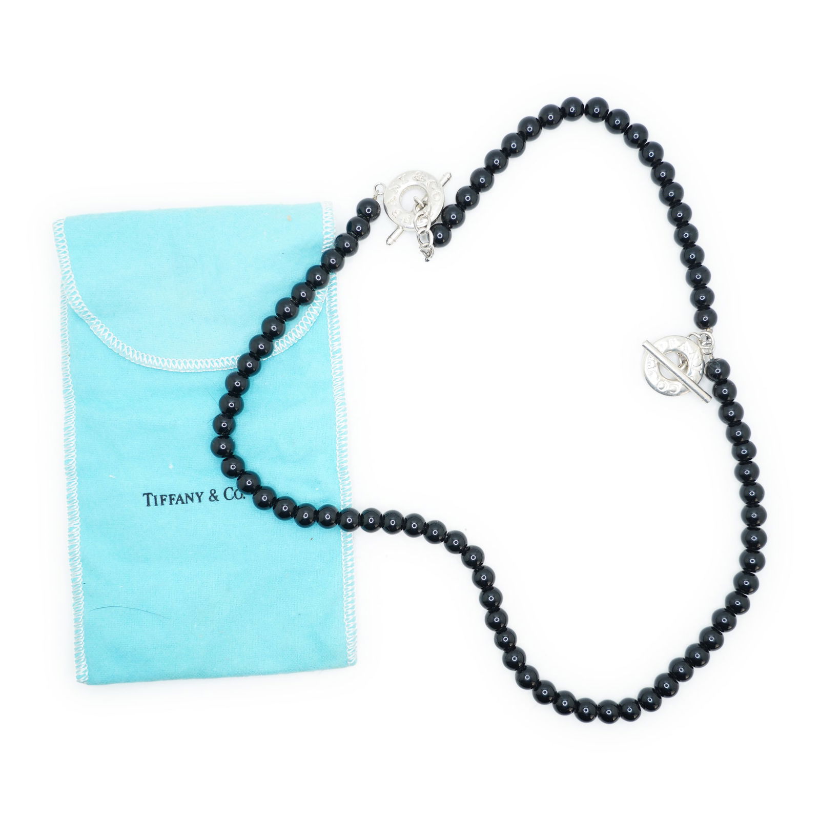 TIFFANY & CO .925 Sterling Silver Black Onyx Beads Necklace with T & Co Toggle Closure: TIFFANY & CO .925 Sterling Silver Black Onyx Beads Necklace with T & Co Toggle Closure, 26 inches x 7/8 in.; or can be worn as a bracelet and necklace 8 1/2 in. x 7/8 in.