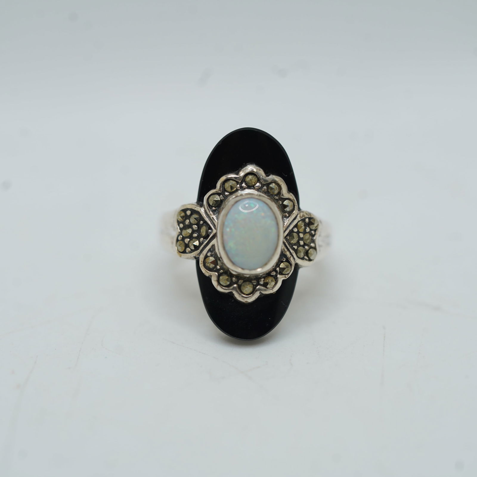 NP .925 Sterling Silver With Black Onyx , Marcasites and Opal Center Ring Size 6.25: NP .925 Sterling Silver With Black Onyx , Marcasites and Opal Center Ring Size 6.25 , 3/4 in. x 1 in.
