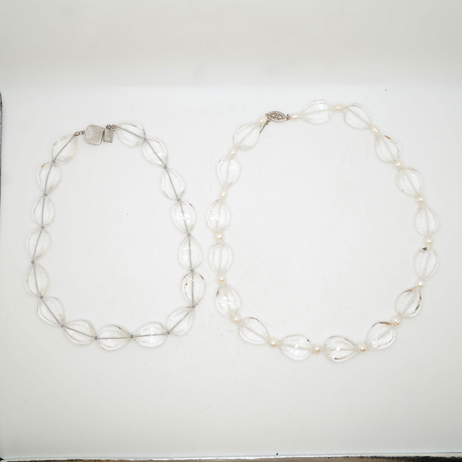 [2] Sterling Silver Clasp With Freshwater Cultured Pearls and Crystal Tear Shape Beads Necklace: [2] Sterling Silver Clasp With Freshwater Cultured Pearls and Crystal Tear Shape Beads Necklace 22 Inches Length x 3/4 in.; Sterling with Crystal Tear Shape Beads Necklace 18 inches length x 3/4 in.