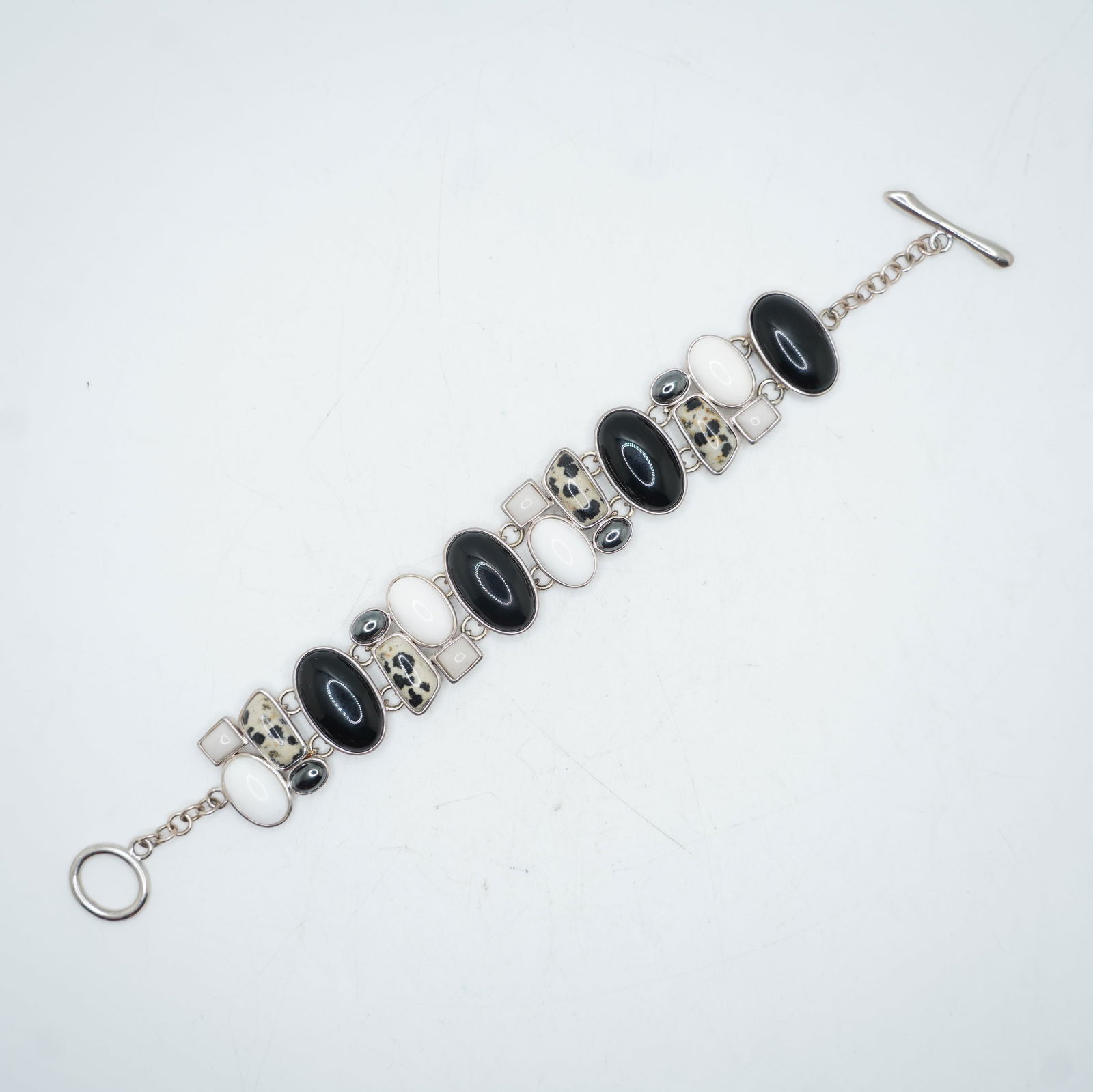 38.10 Grams Total Weight .925 Sterling Silver WK Black Onyx, Agate, White Stones, Dalmation Agate: 38.10 Grams Total Weight .925 Sterling Silver WK Black Onyx, Agate, White Stones, Dalmation Agate Bracelet 8 inches x 1 inch