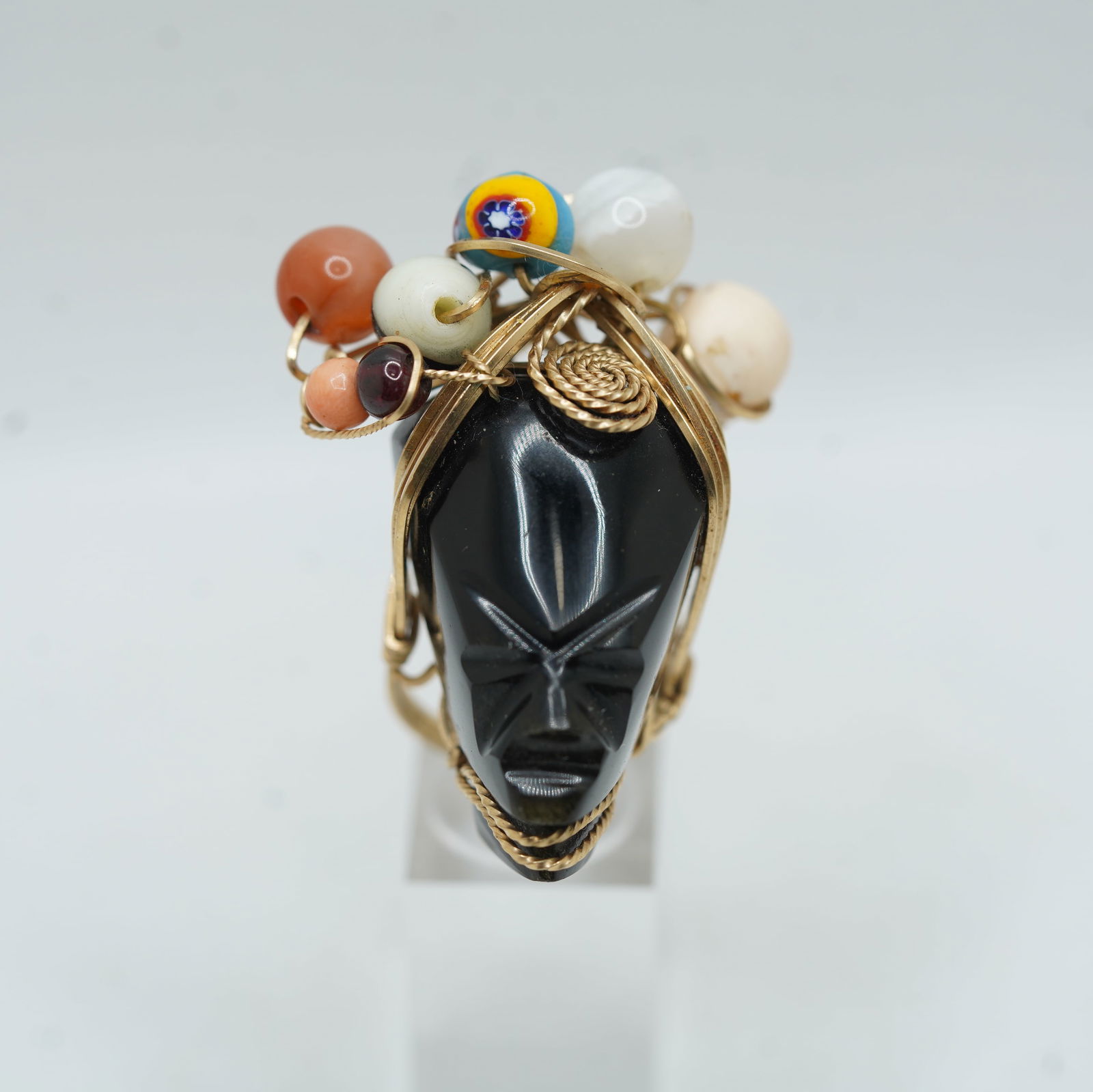 Quality Black Ebony Tribal Woman's Head with Black Onyx and 7 Beads Wire Ring Size 7, 2 inches: Quality Black Ebony Tribal Woman's Head with Black Onyx and 7 Beads Wire Ring Size 7, 2 inches x 1 1/2 inches.