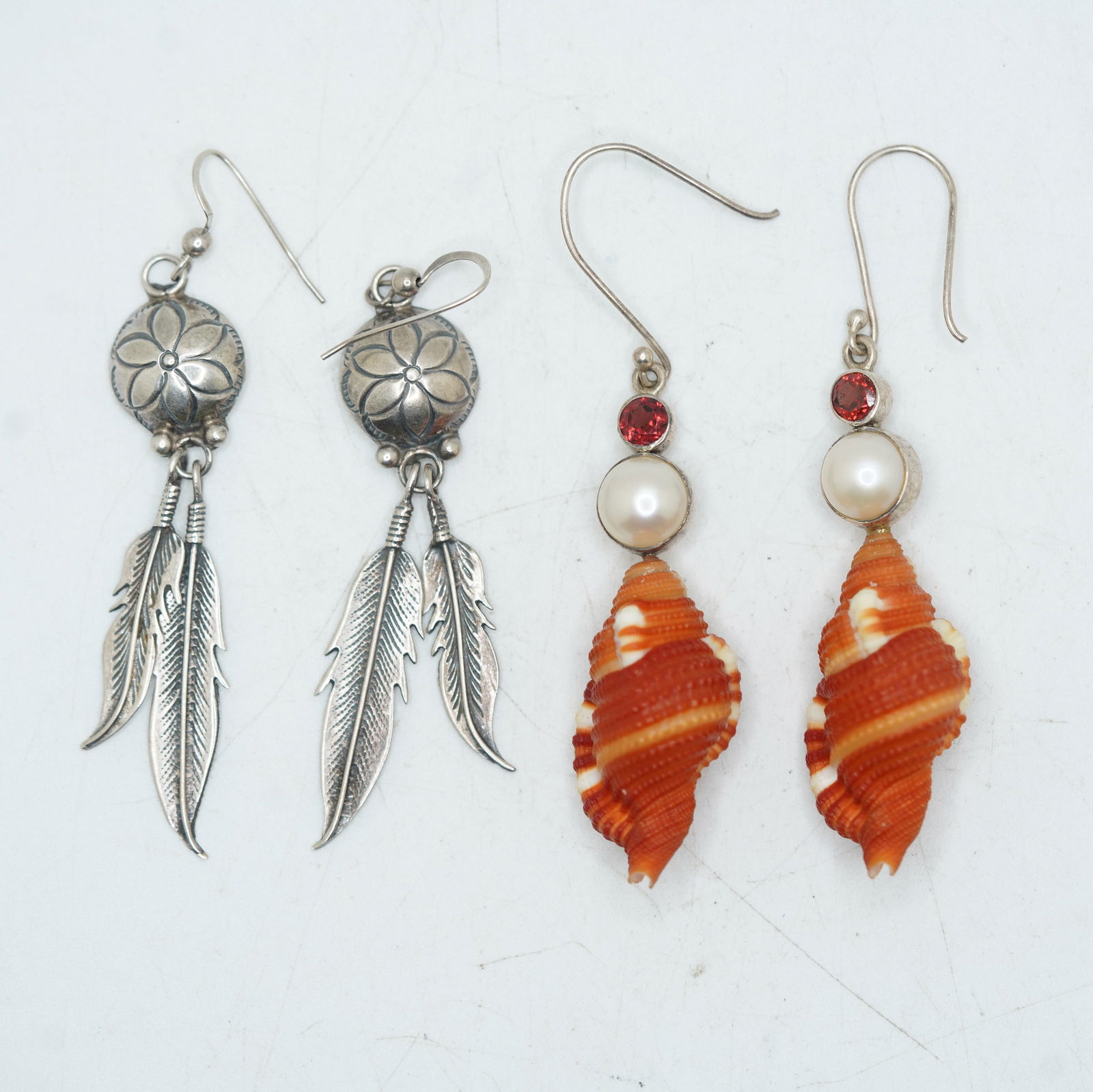 Native American Indian 21.24 Grams Sterling Silver Feather Drop Pierced Earrings; Arye 925 Drop: Native American Indian 21.24 Grams Sterling Silver Feather Drop Pierced Earrings; Arye 925 Drop Shell Earrings With Garnets and Freshwater Pearls 3 in. x 3/4 in.