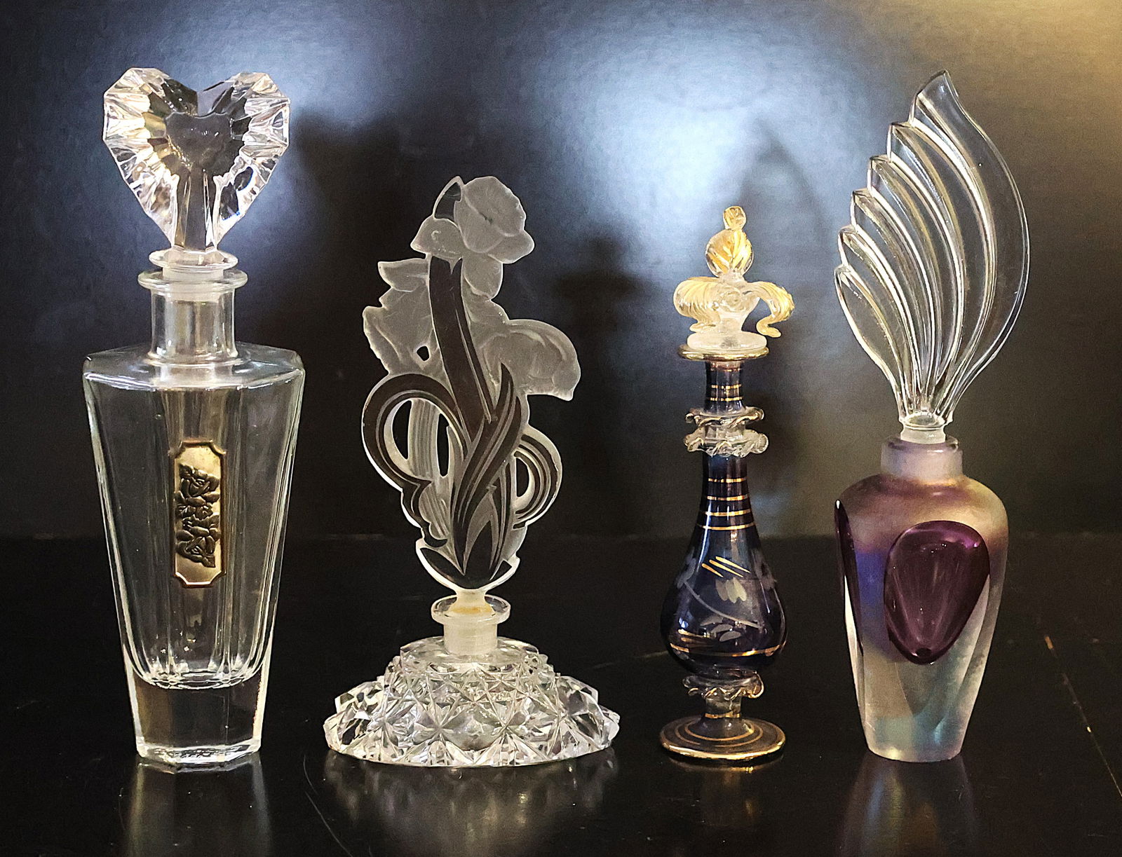 4 Assorted Perfume Bottlesl Sizes 9 in., 7.75 in., 7.5 in., 9 in. (1 of 3)