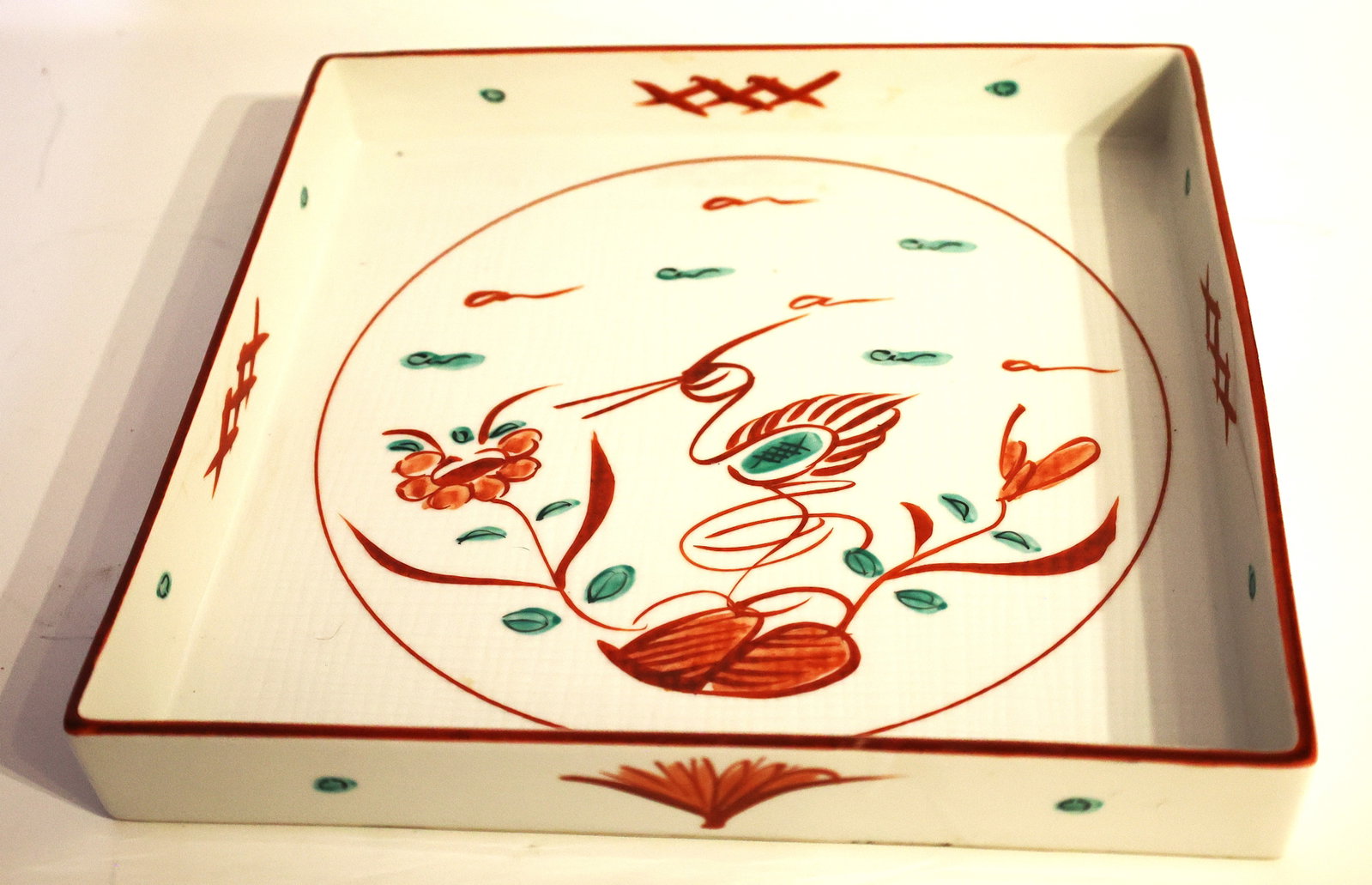 Vintage Tiffany & Co. Porcelain Serving Tray Featuring a Japanese Crane and Flower Motif 11 in.: vintage Tiffany & Co. porcelain serving tray featuring a Japanese-inspired design with a crane and flower motif. Design: Hand-painted crane and floral pattern in red and green. Form: Square porcelain 