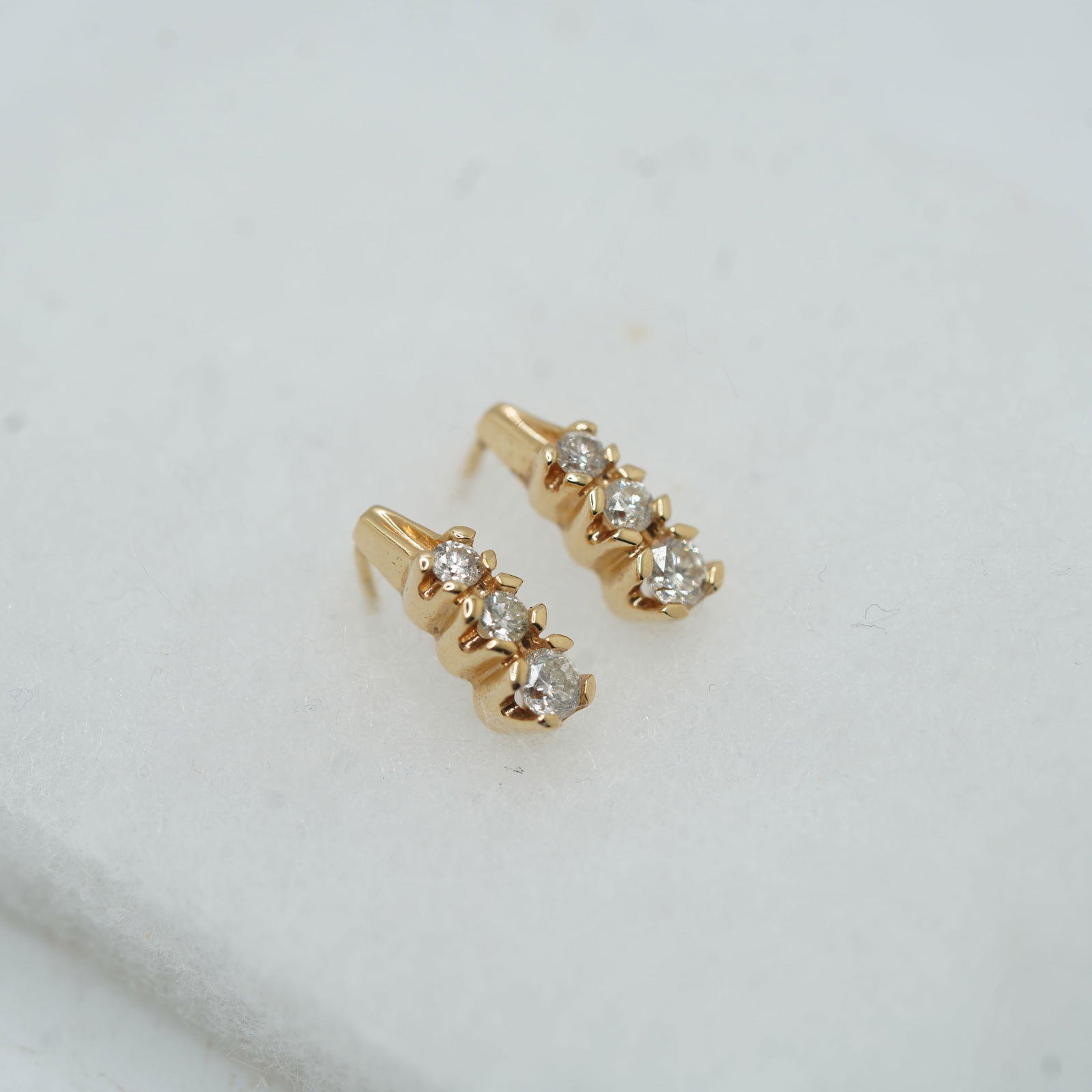 1.61 DWT 14K Yellow Gold 3 Graduating Diamond Pierced Earrings 1/2 in. x 1/4 in. (1 of 13)
