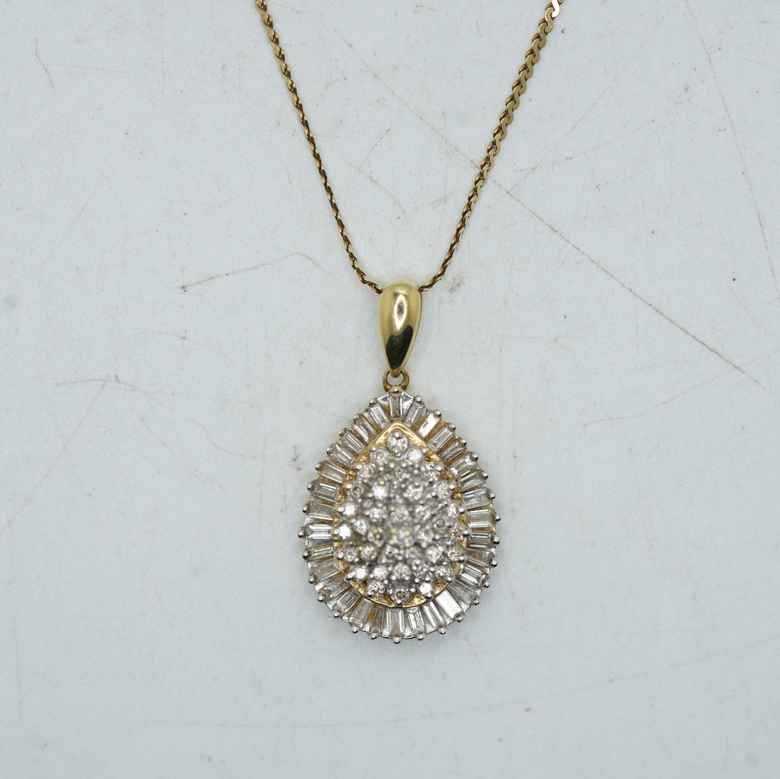 4.30 DWT 14K Yellow Gold Tear Shape Diamond Cluster Surrounded by Diamond Baguettes (1 of 10)