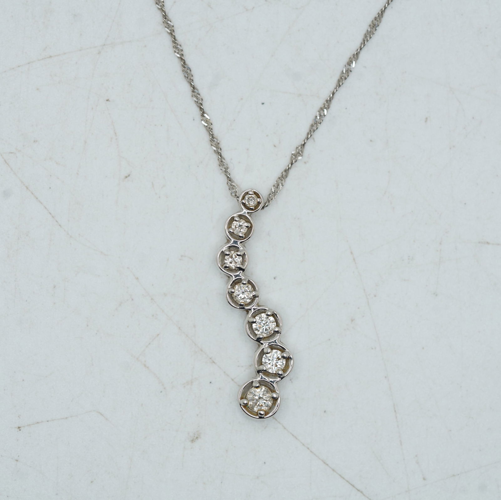 2.91 DWT Midas 14K Gold 7 Graduated Diamonds Pendant on 14K Gold 22 in. Chain (1 of 11)