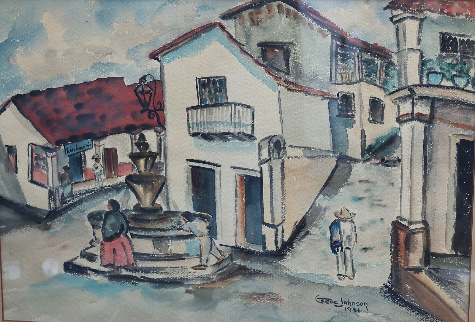 Estelle Johnson 1941, Vintage Watercolor Painting, likely depicting a Town scene in Mexico: Estelle Johnson 1941, Vintage Watercolor Painting, likely depicting a Town scene in Mexico. A town square featuring white buildings with red-tiled roofs, a fountain, and figures in traditional attire.