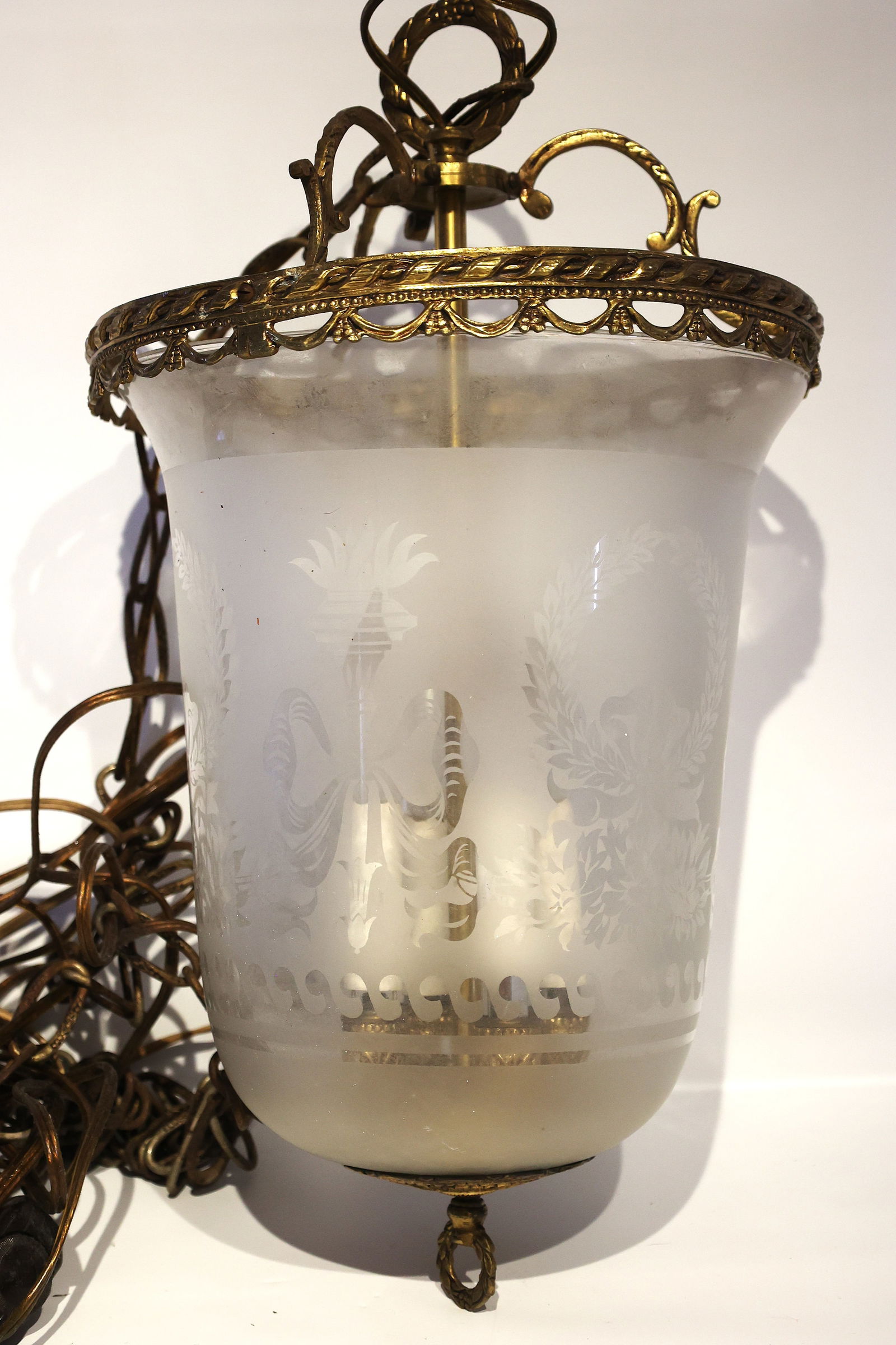 French Bronze Etched Glass Pendant Hanging Fixture Etched Delicate Floral and Neoclassical Motifs.: French Bronze Etched Glass Pendant Hanging Fixture Etched Delicate Floral and Neoclassical Motifs. ; Size: 19 inches length x 10.5 inches diameter ; has a long chain for hanging