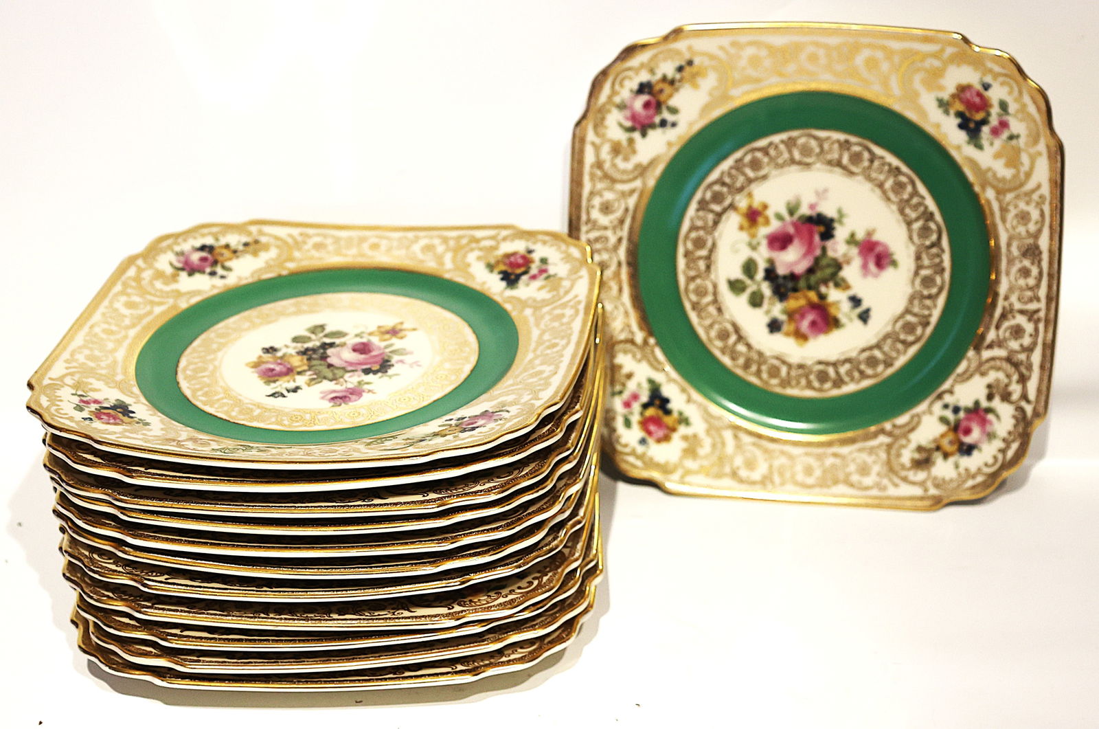12 Bohemian "Royal Ivory" Czech Square Shape with Indented Corners, green border, gilding, Floral: 12 Bohemian "Royal Ivory" Czech Square Shape with Indented Corners, green border, gilding, Floral Luncheon Plates. . Size: 8 inches diameter