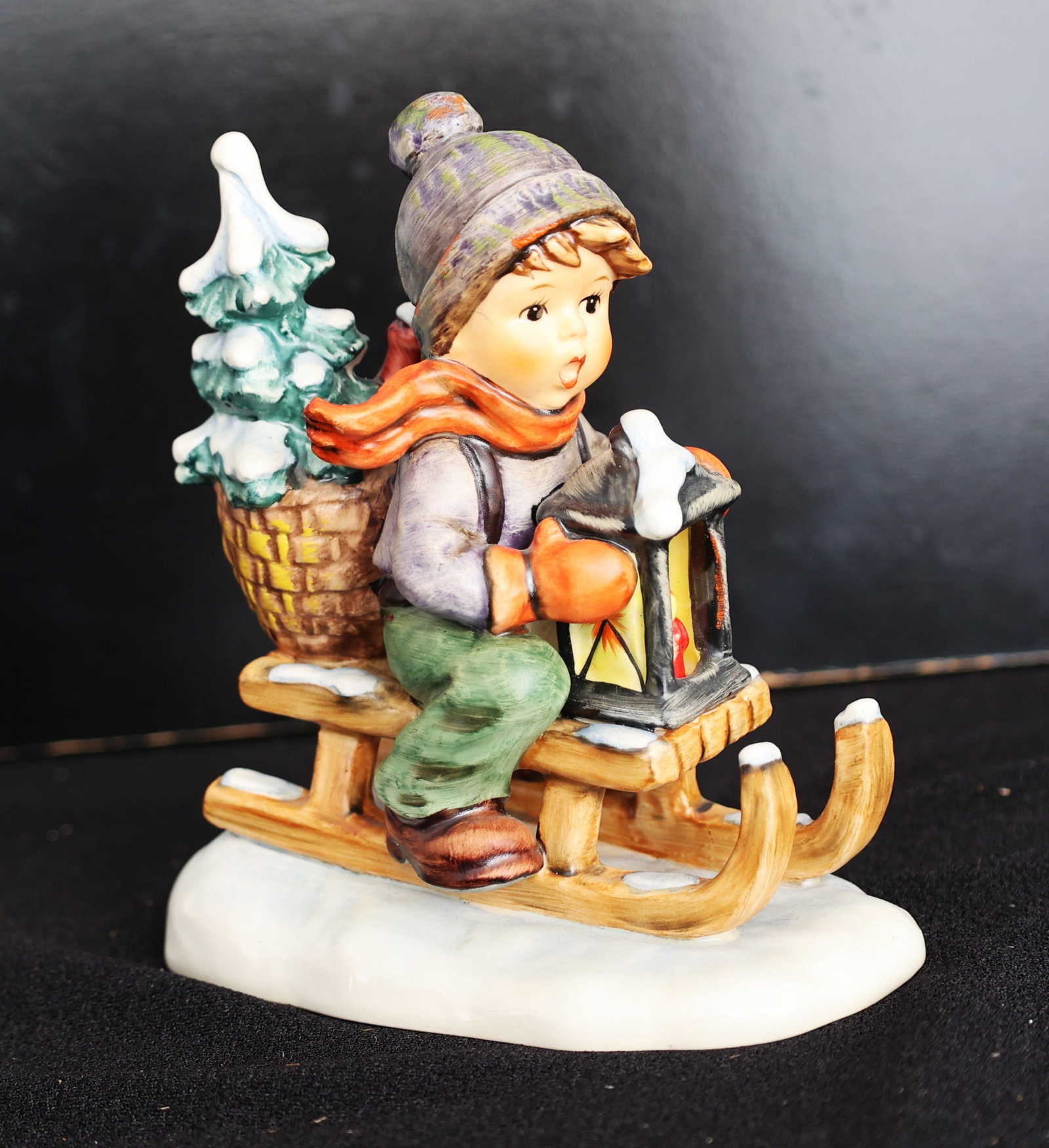 "Ride into Christmas" figurine produced by Goebel under the M.I. Hummel brand, 6 inches height (1 of 5)