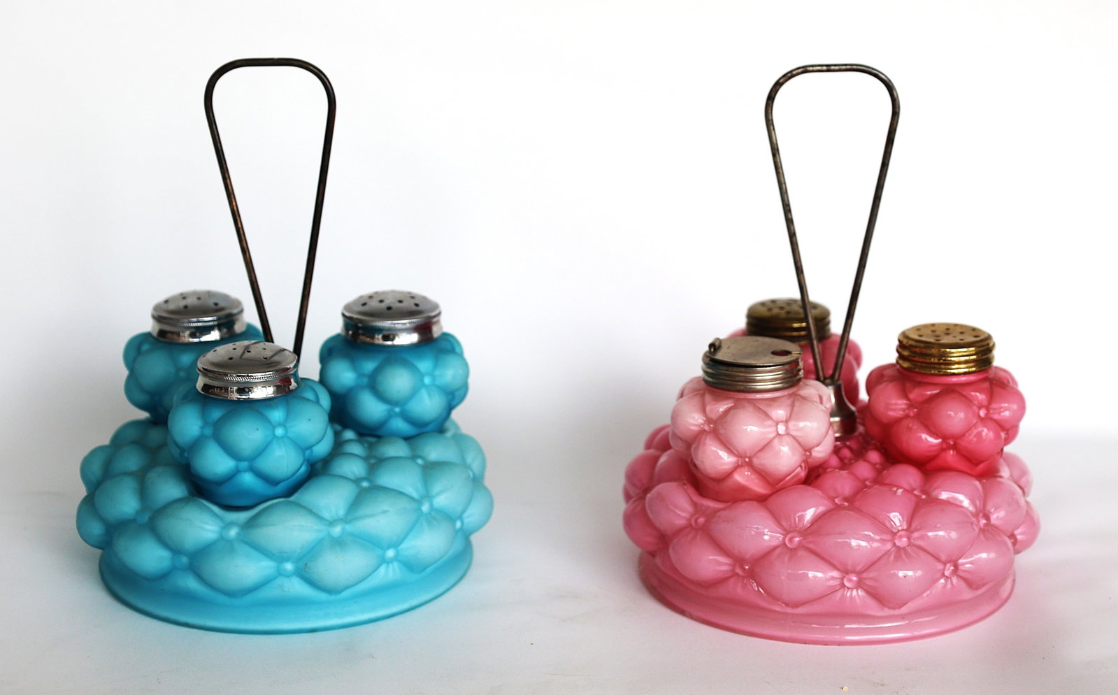 2 antique J.E. Caldwell & Co. glass condiment castor sets, likely produced between 1894 and 1900.De: Size: 7 1/2 in. height , 6 in. wide ; 2 antique J.E. Caldwell & Co. glass condiment castor sets, likely produced between 1894 and 1900.Design Pattern: The quilted, bubble-like texture is known as the 