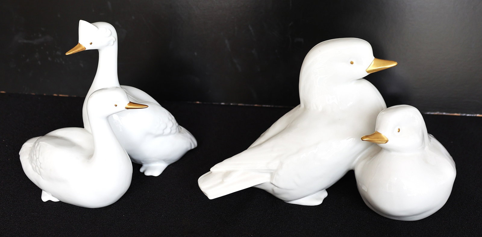 set of vintage Hungarian porcelain figurines made by Hollohaza, featuring stylized white birds with (1 of 7)