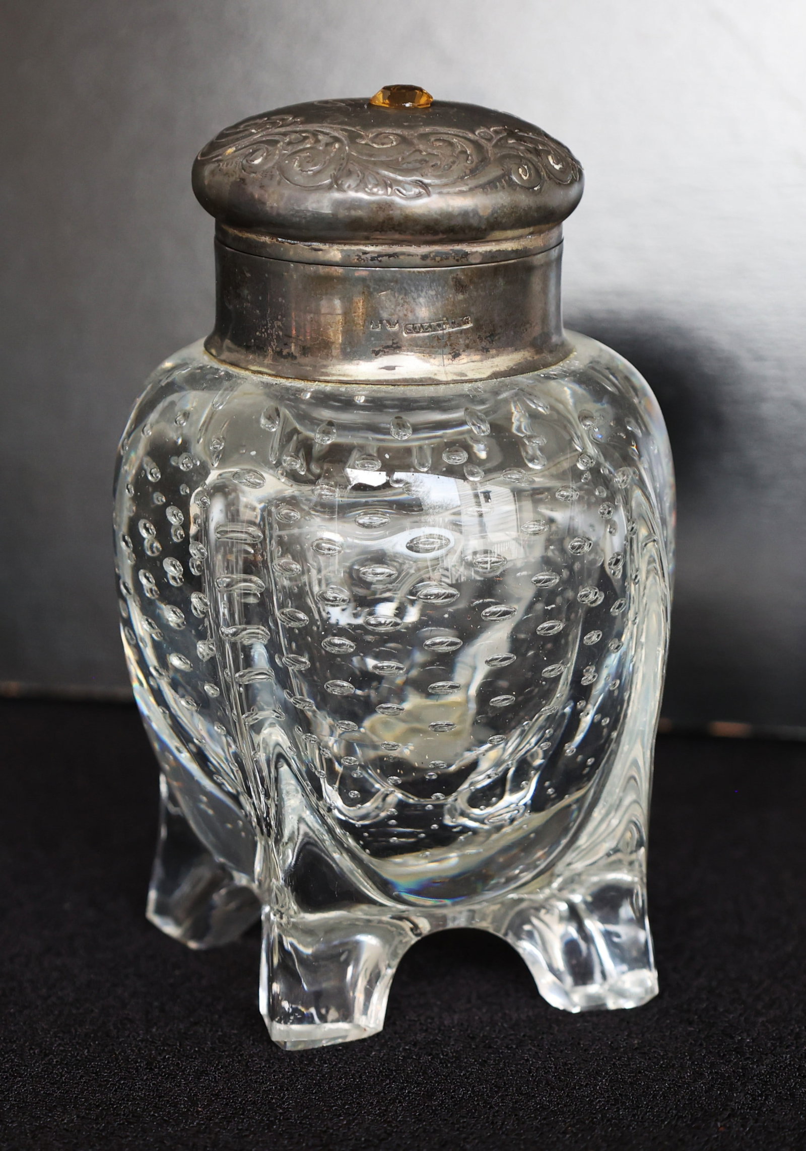 Antique controlled bubble art glass footed bottle featuring a sterling silver top (1 of 8)