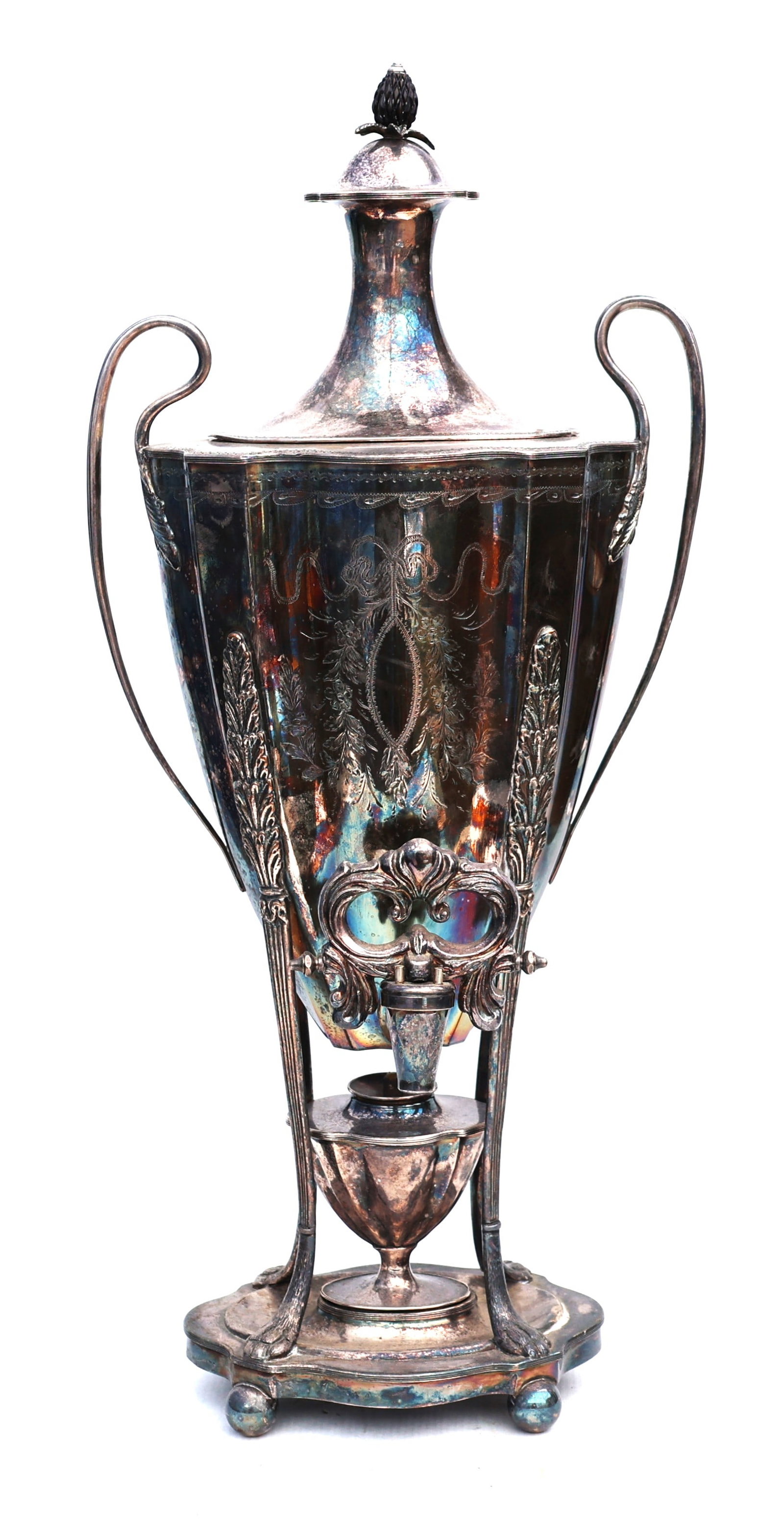 antique 19th-century Victorian silver-plated samovar, designed as a hot water or coffee urn.It feat: Size: 18 1/2 in. height x 9 in. wide ; antique 19th-century Victorian silver-plated samovar, designed as a hot water or coffee urn.It features ornate handles, a prominent spigot, and a burner stand fo